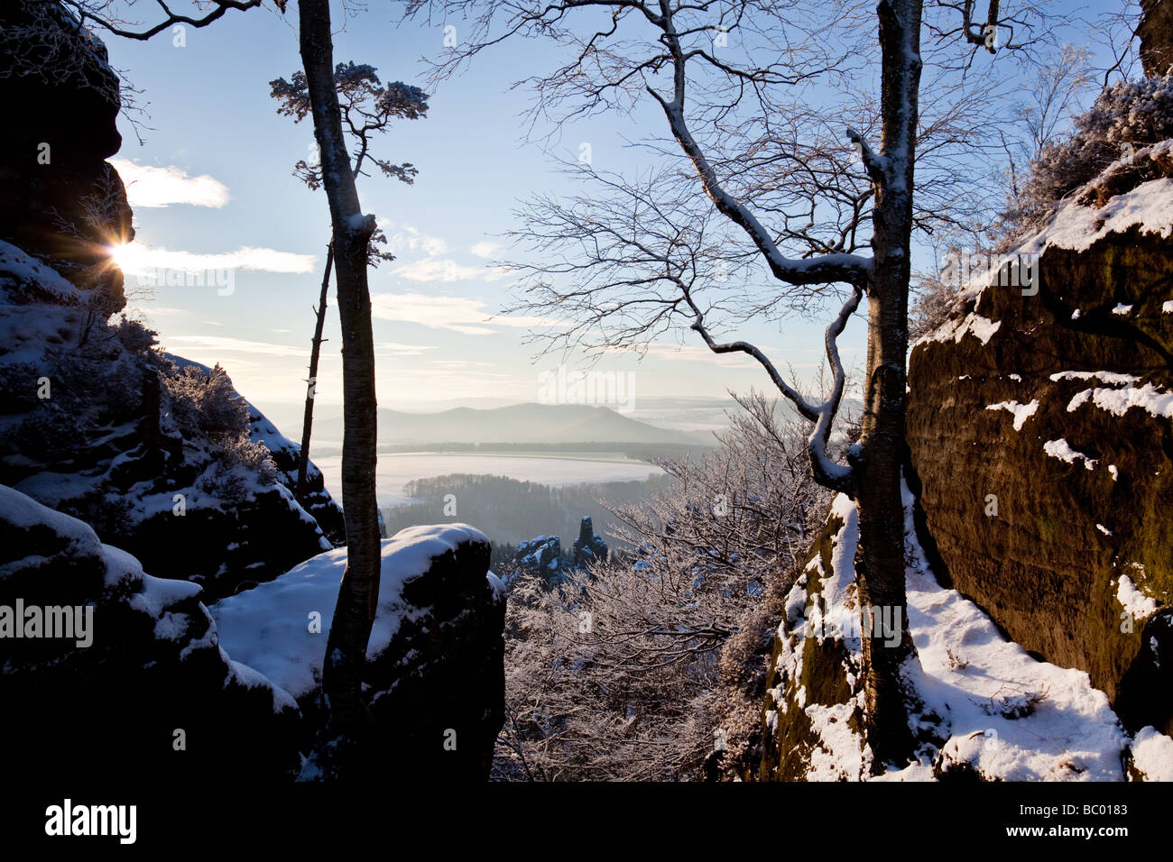 Panoramic view from Schrammsteine in national park 'Sächsische Schweiz“, Germany, into the winter scenery Stock Photo