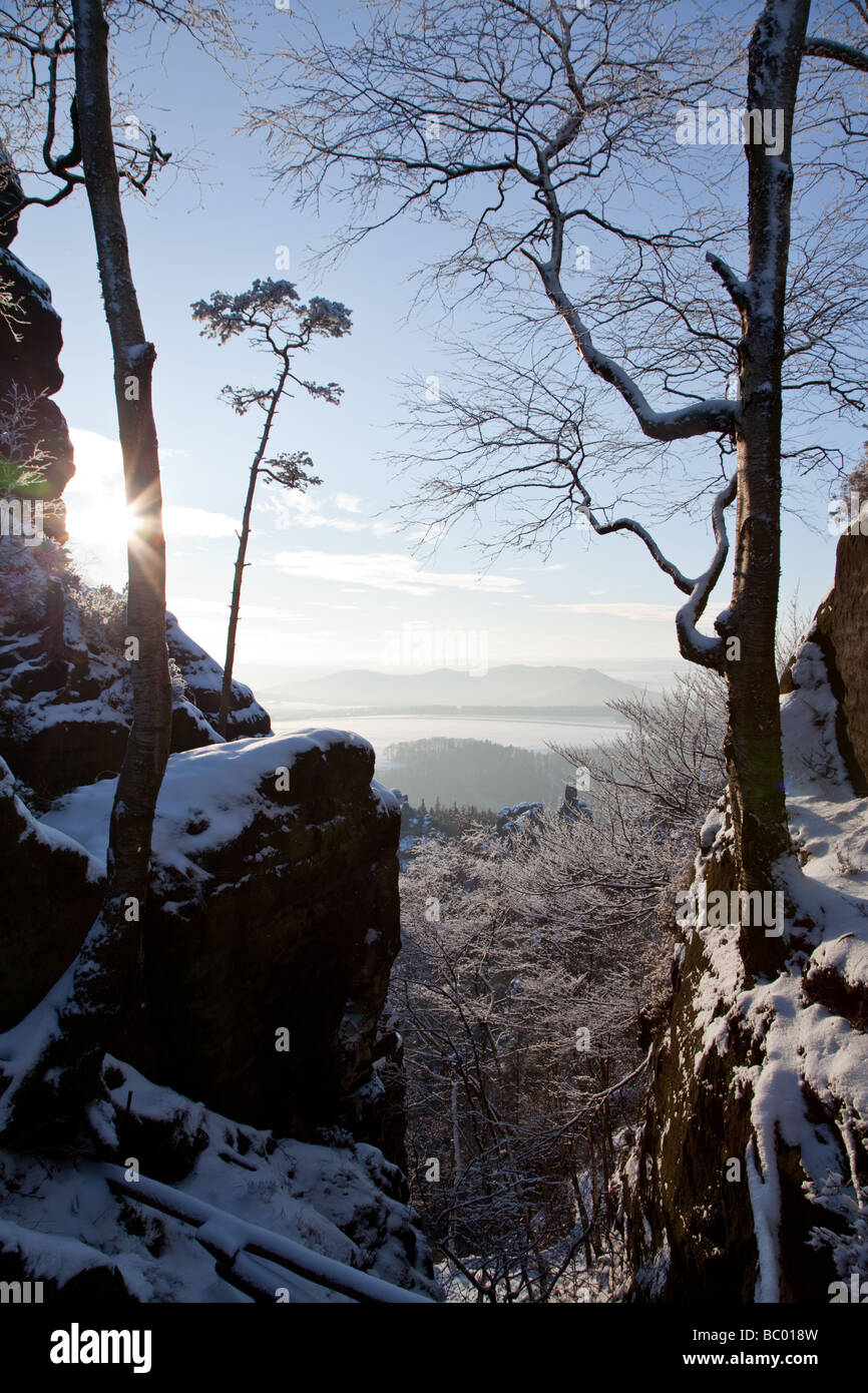 Panoramic view from Schrammsteine in national park „Sächsische Schweiz“, Germany, into the winter scenery Stock Photo