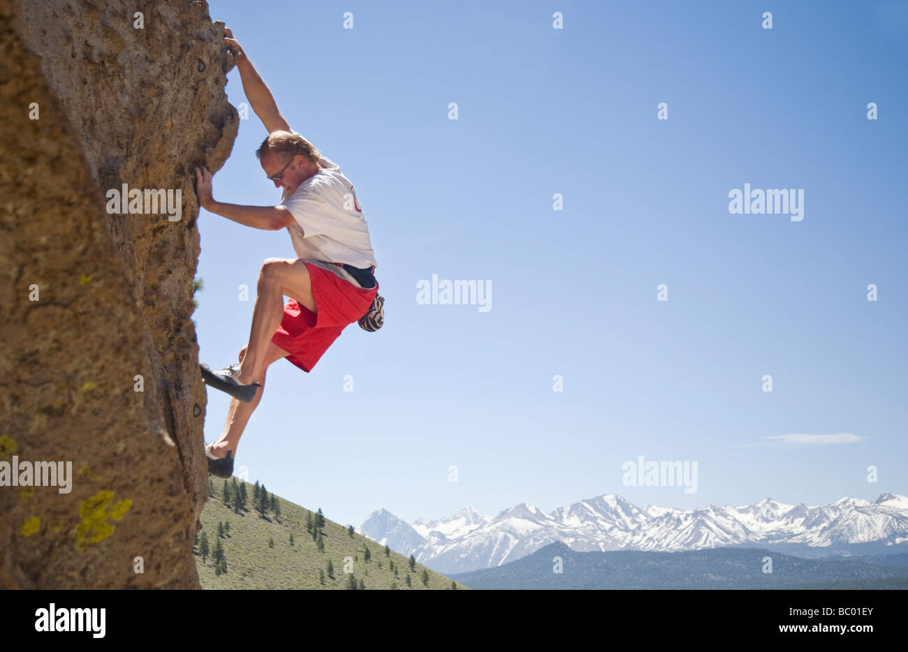 A man solo climbing in the Sierras. Stock Photo