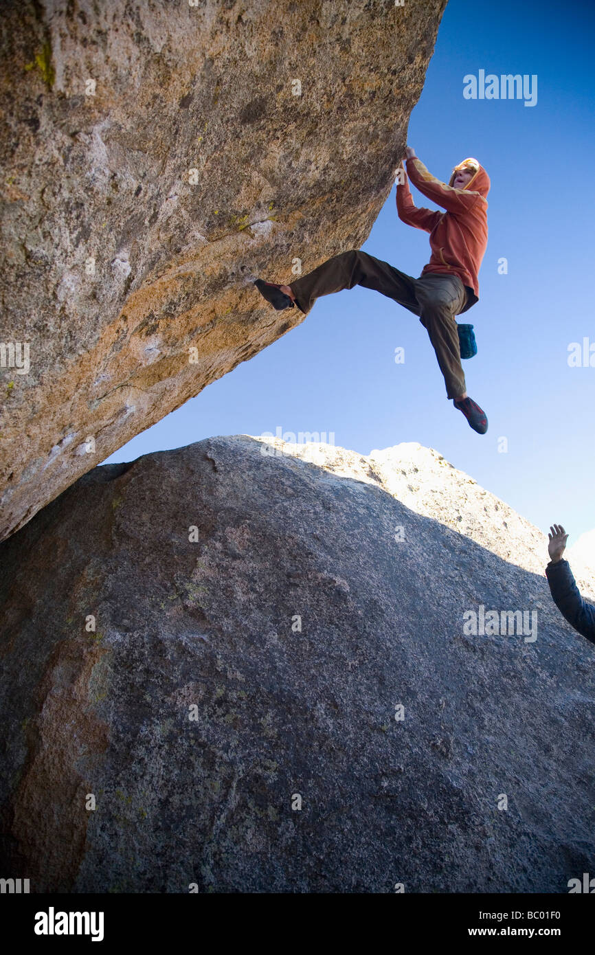 A man bouldering in the Buttermilks. Stock Photo