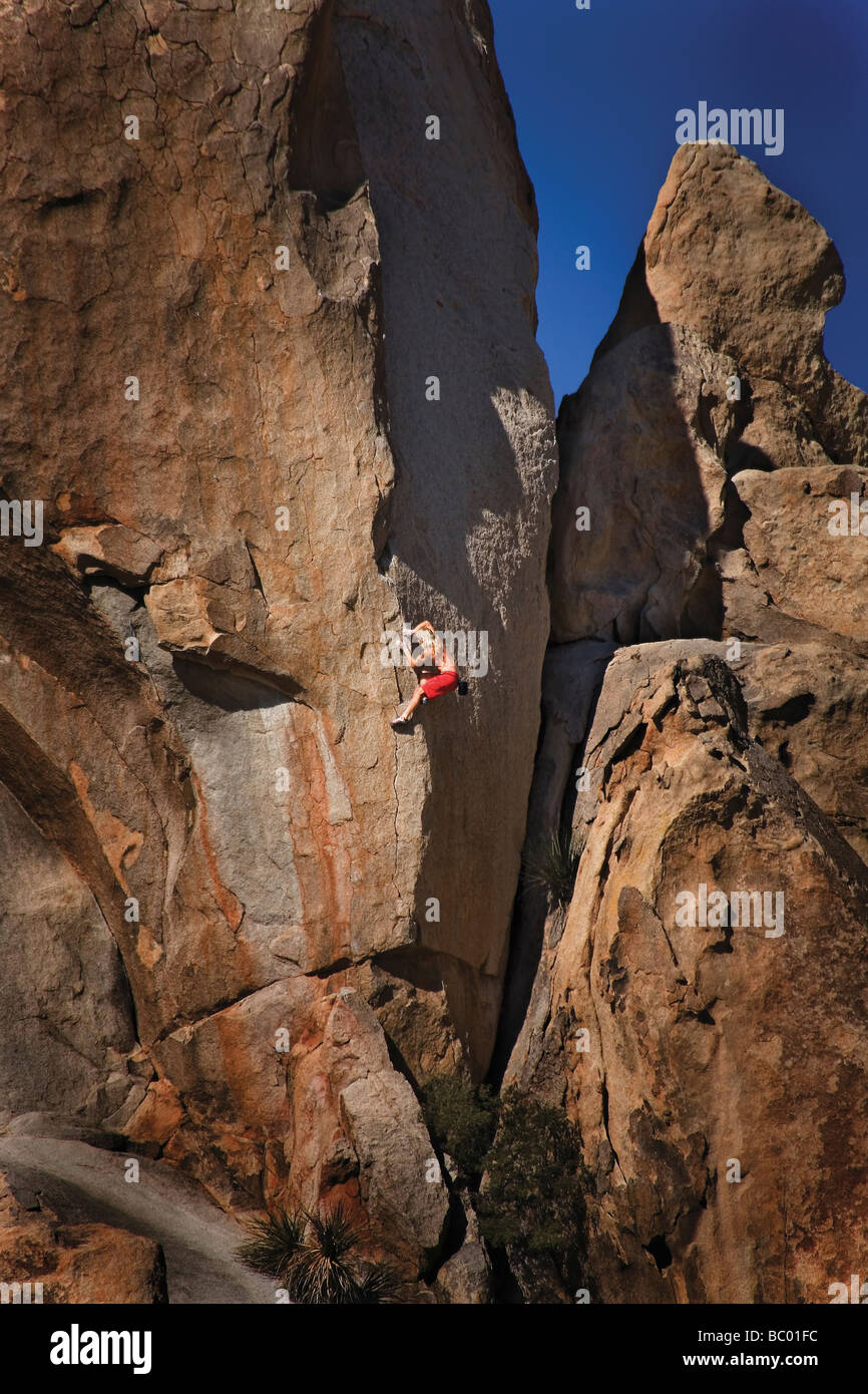 A man solo climbs Tic Tic Boom (12c). Stock Photo