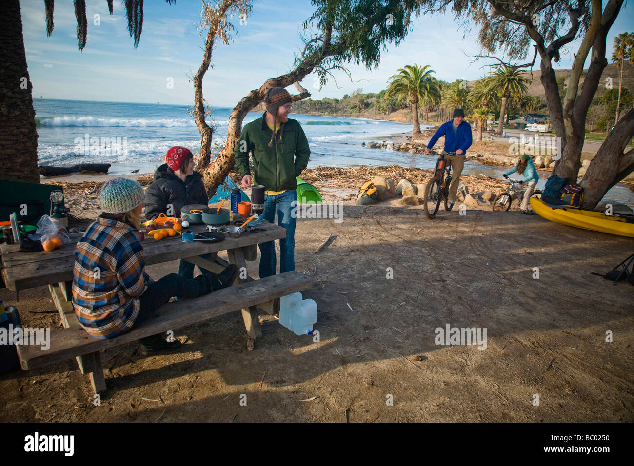 A group of young adults camping at El Capitan State Beach. Stock Photo