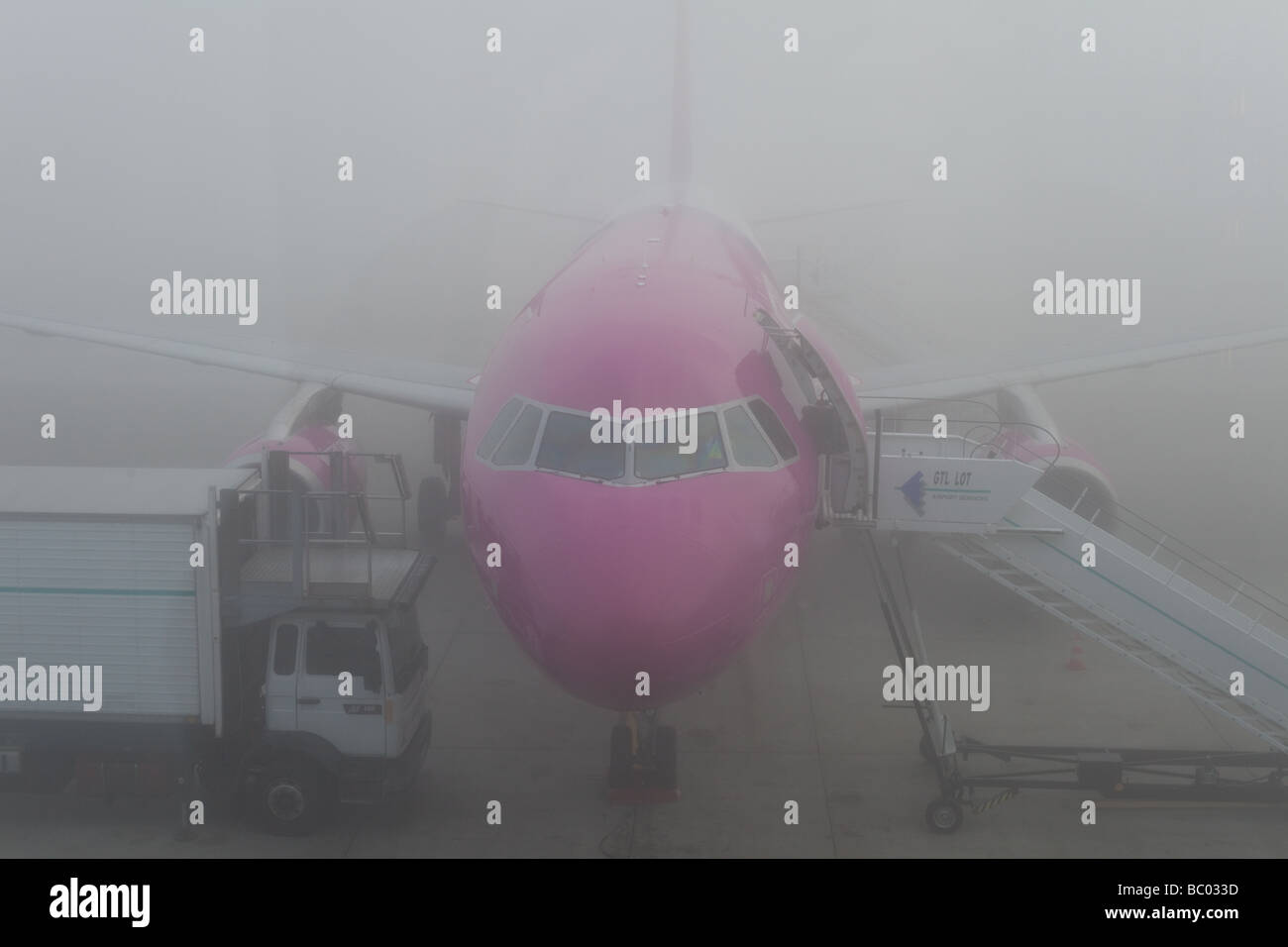 Delayed aeroplane in fog Stock Photo