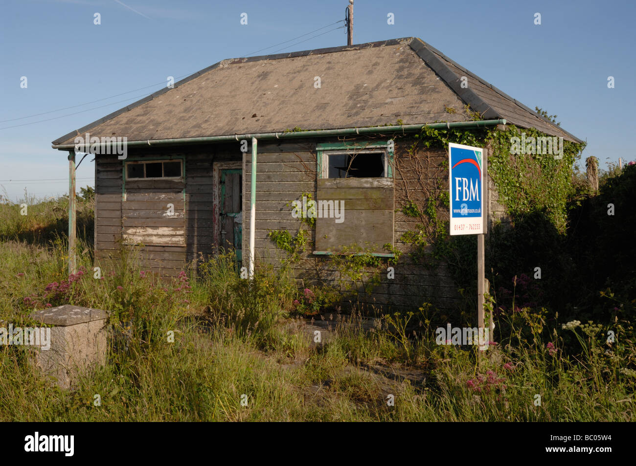 Derelict wooden shack for sale Marloes Pembrokeshire Wales UK Europe Stock Photo Alamy