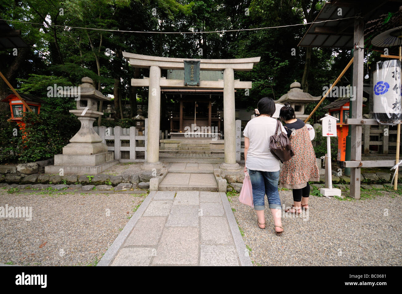Stone Torii and little shrine. Yasaka Shinto Shrine complex. Kyoto ...