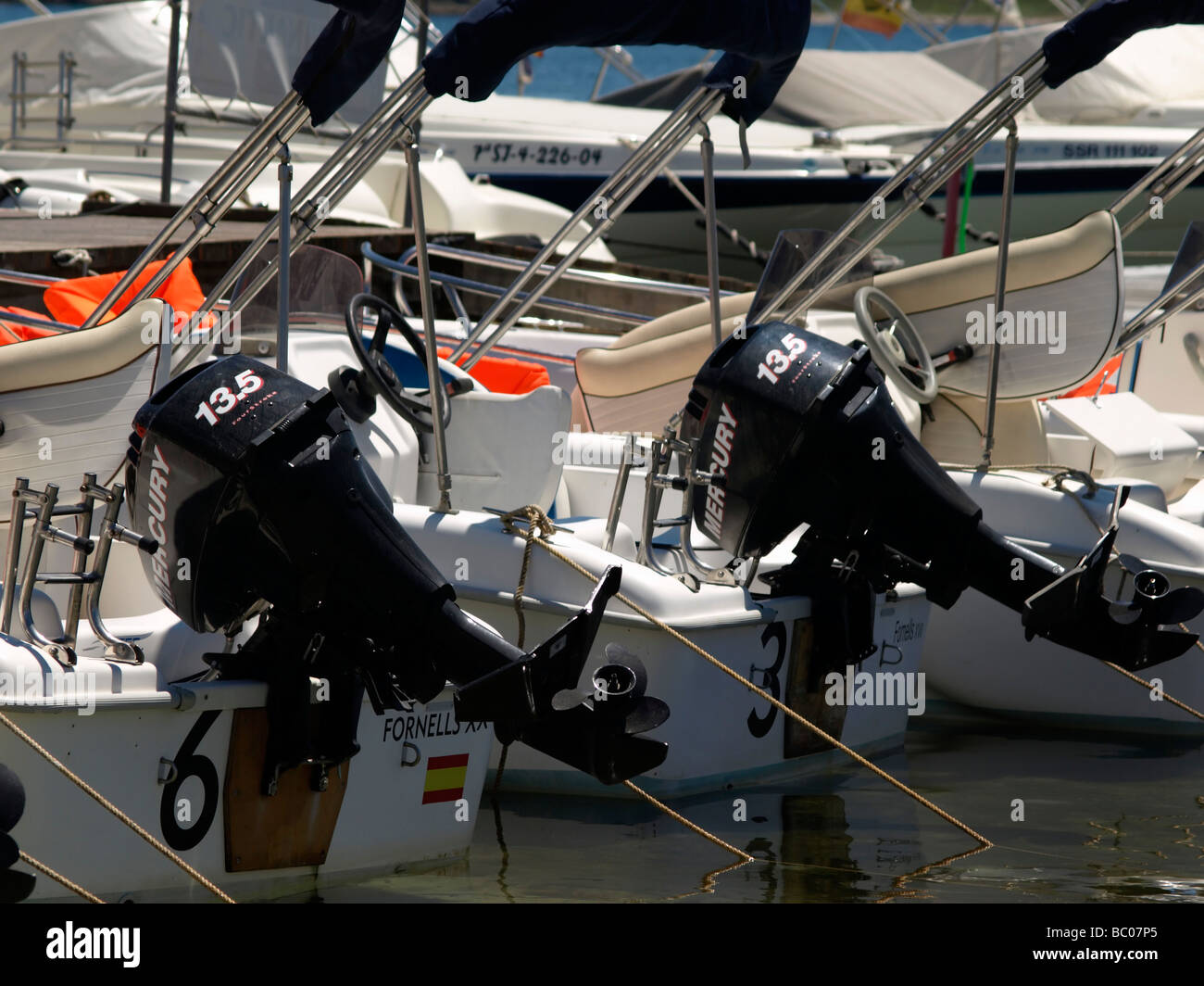 Two 13.5 HP Mercury outboard motors. - Stock Image