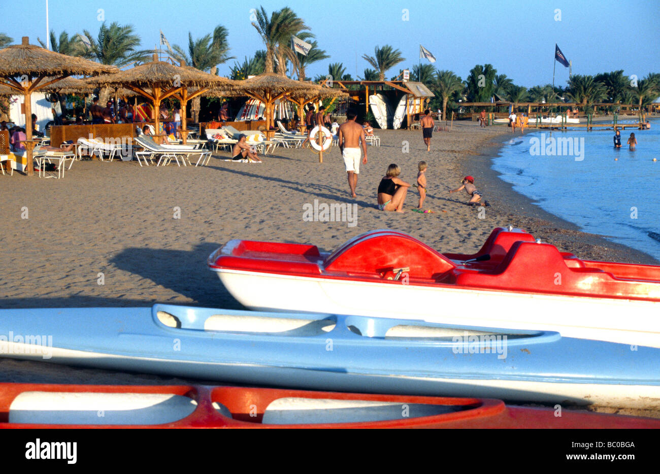 Kayaks pedalos on Golden Beach Hilton Dahab Dahab Sinai Red Sea Egypt Stock Photo