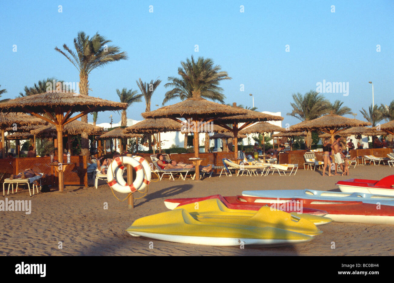 Kayaks pedalos on Golden Beach Hilton Dahab Sinai Red Sea Egypt Stock Photo