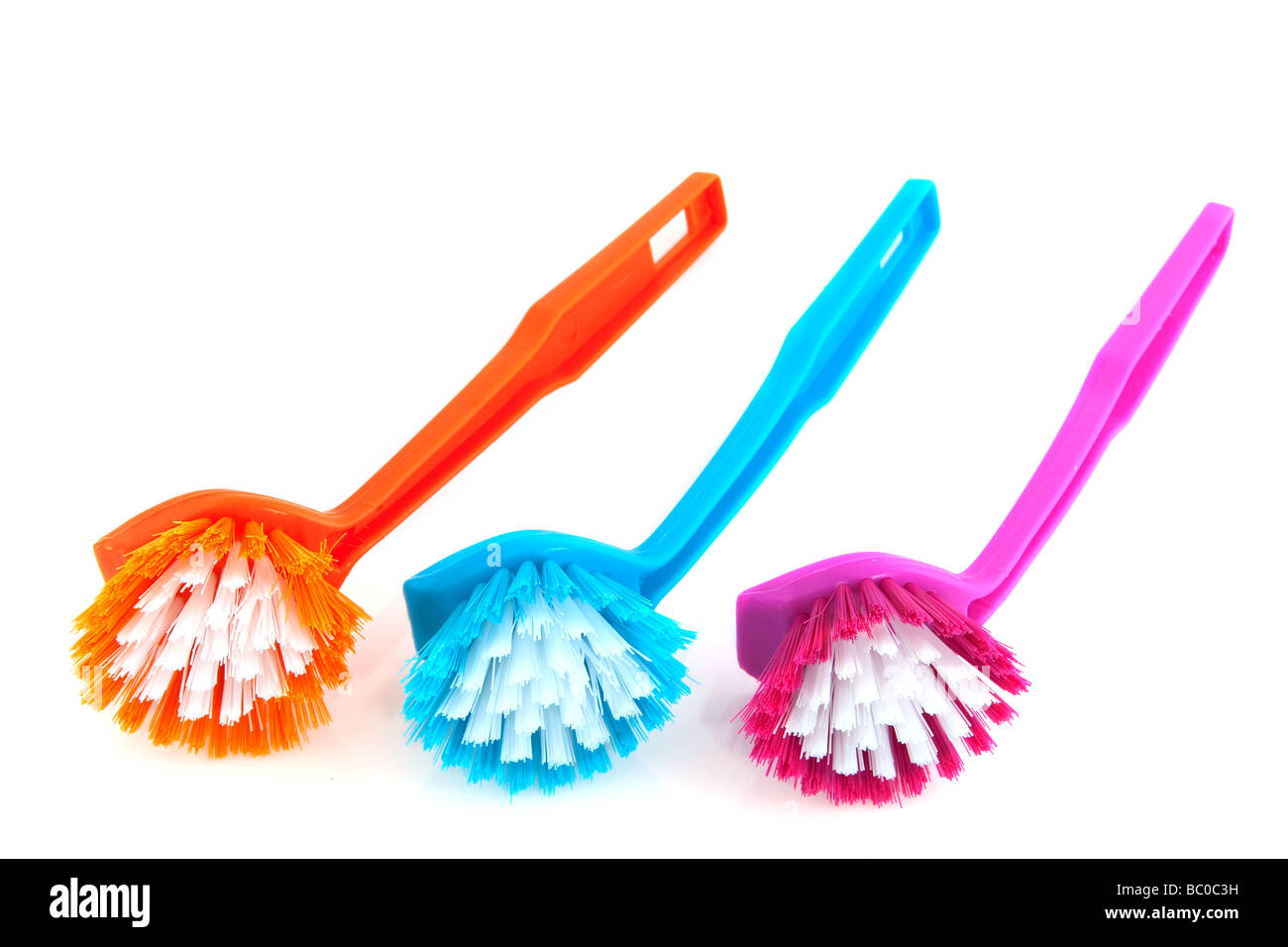 colorful brushes for washing the dishes Stock Photo Alamy