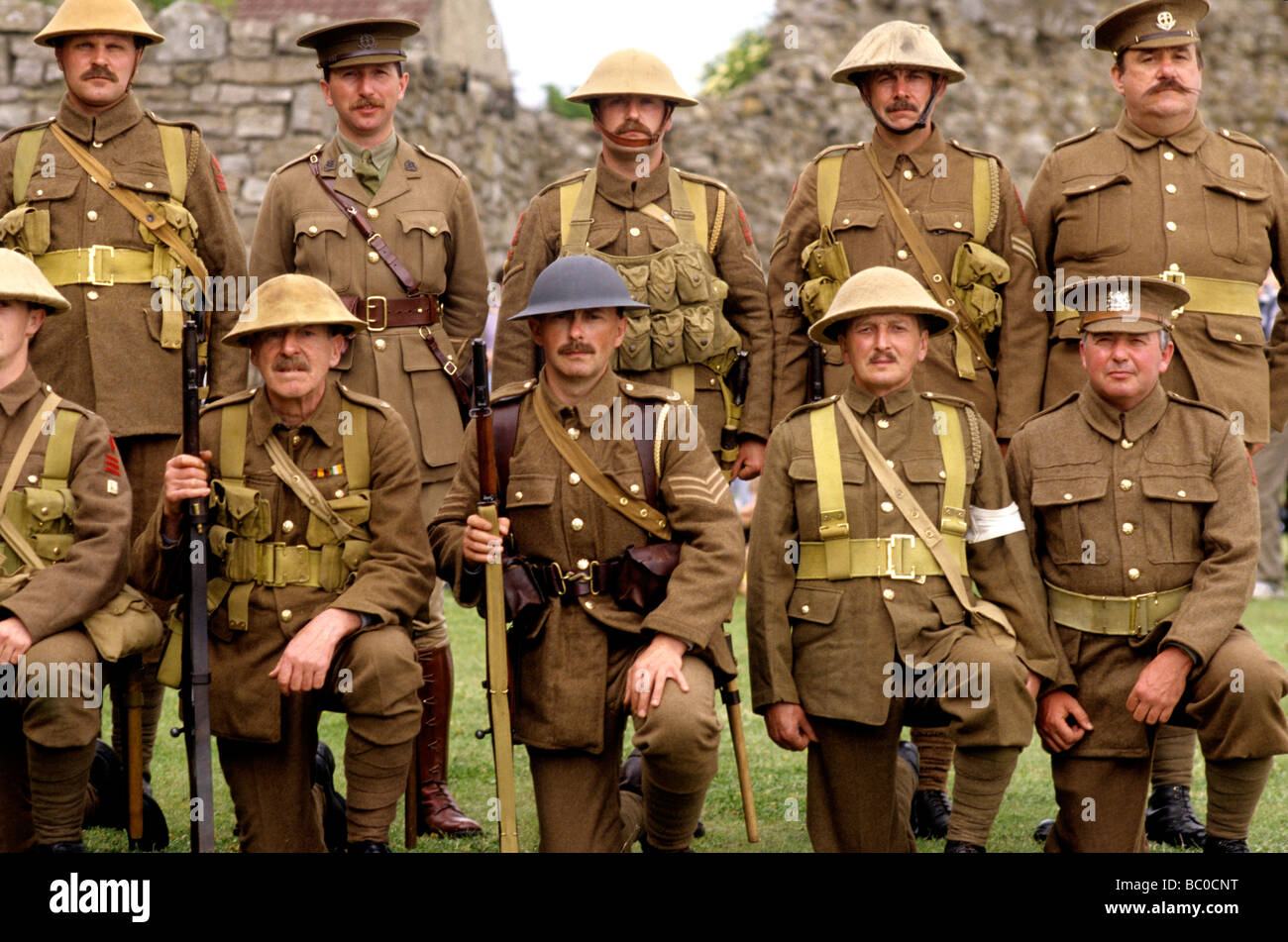 1st First World War 1 historical re-enactment privates and officer soldier  soldiers British military khaki uniform uniforms Stock Photo - Alamy