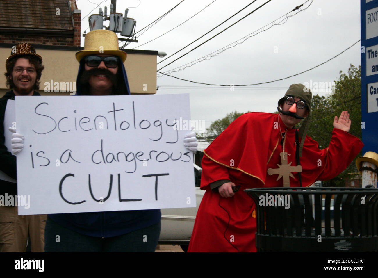 Members of the group Anonymous protesting the Church of Scientology in Richmond, Virginia Stock Photo