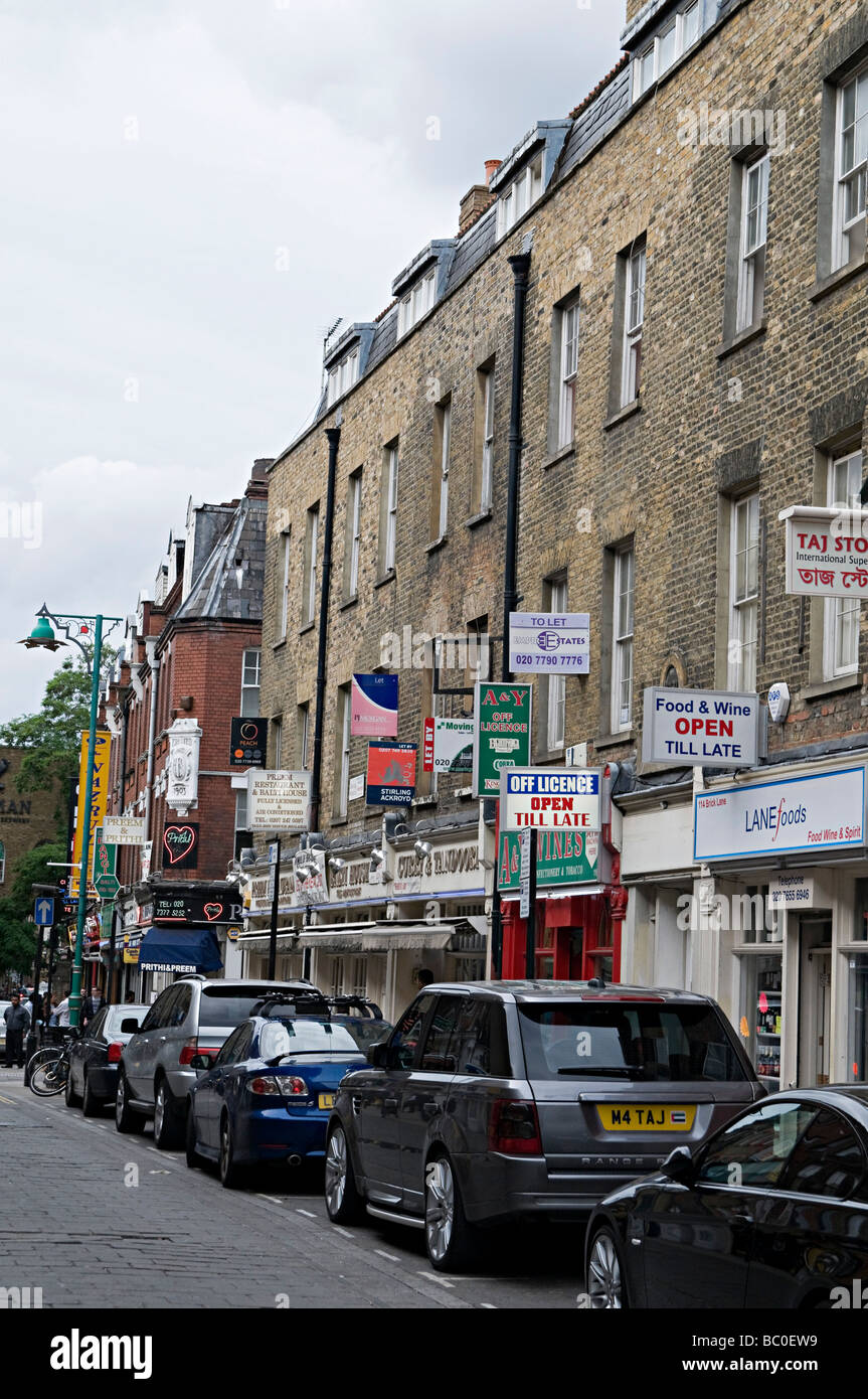 famous curry restaurant signs down brick lane in the east end of london