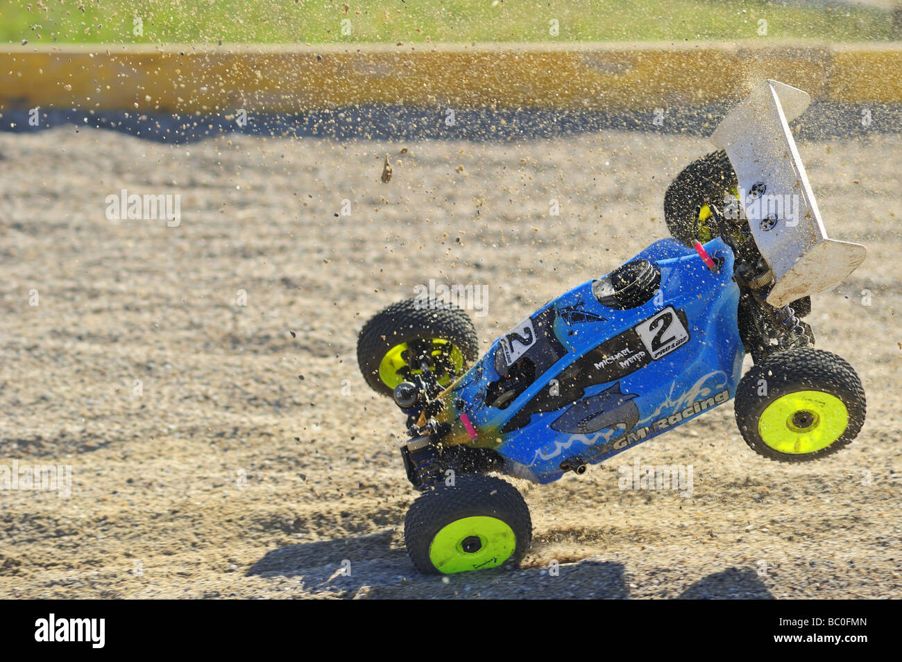 Action shot of a radio-controlled buggy racing in the European Championships. Motion blur shows the speed it’s travelling. Stock Photo