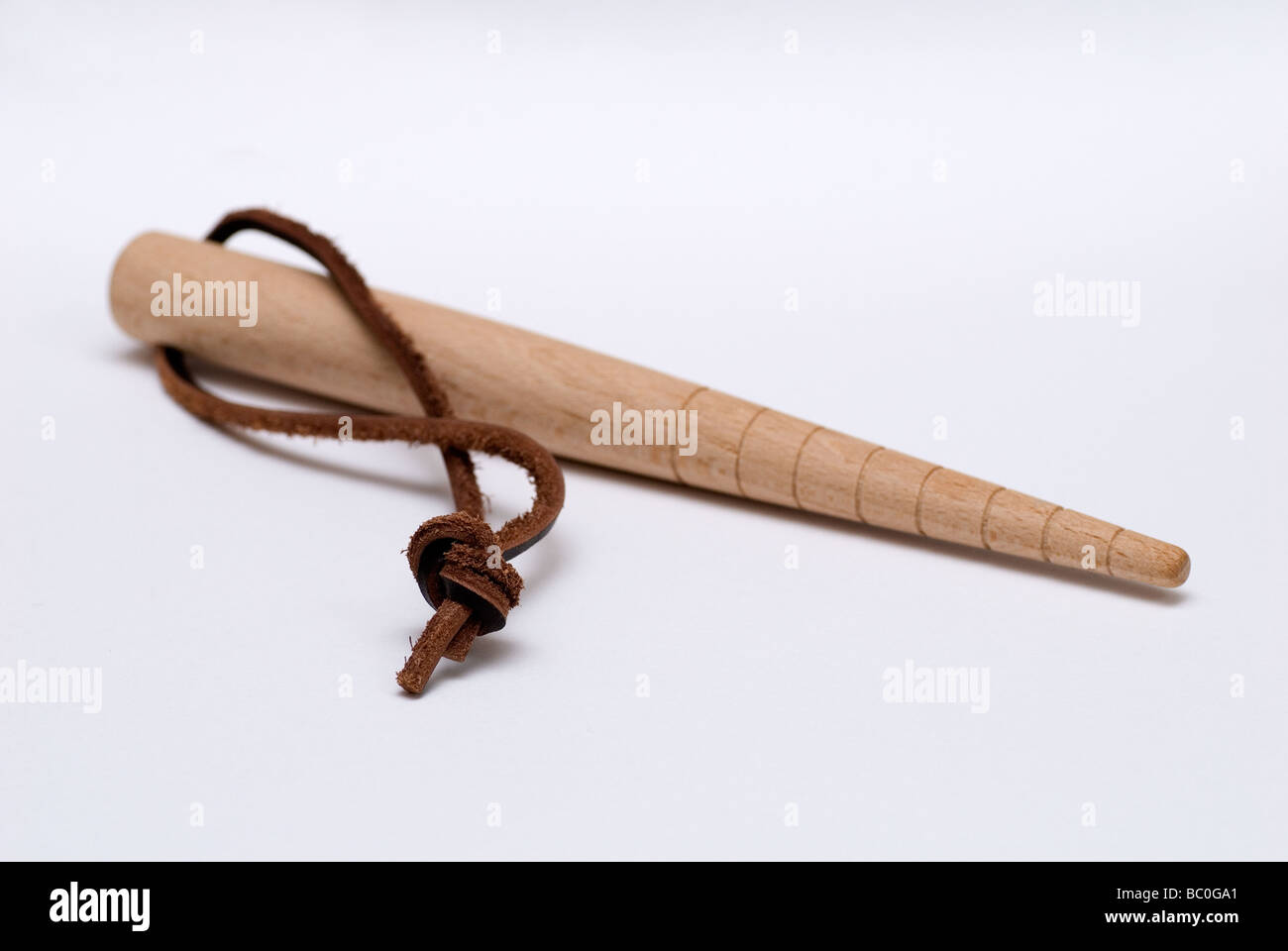 A Traditional Wooden Dibber used for sowing seeds Stock Photo