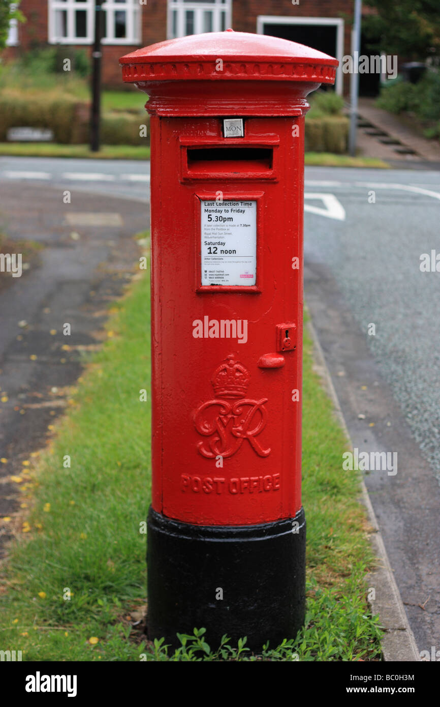A Georgian red letter box in a typical suburban street Stock Photo