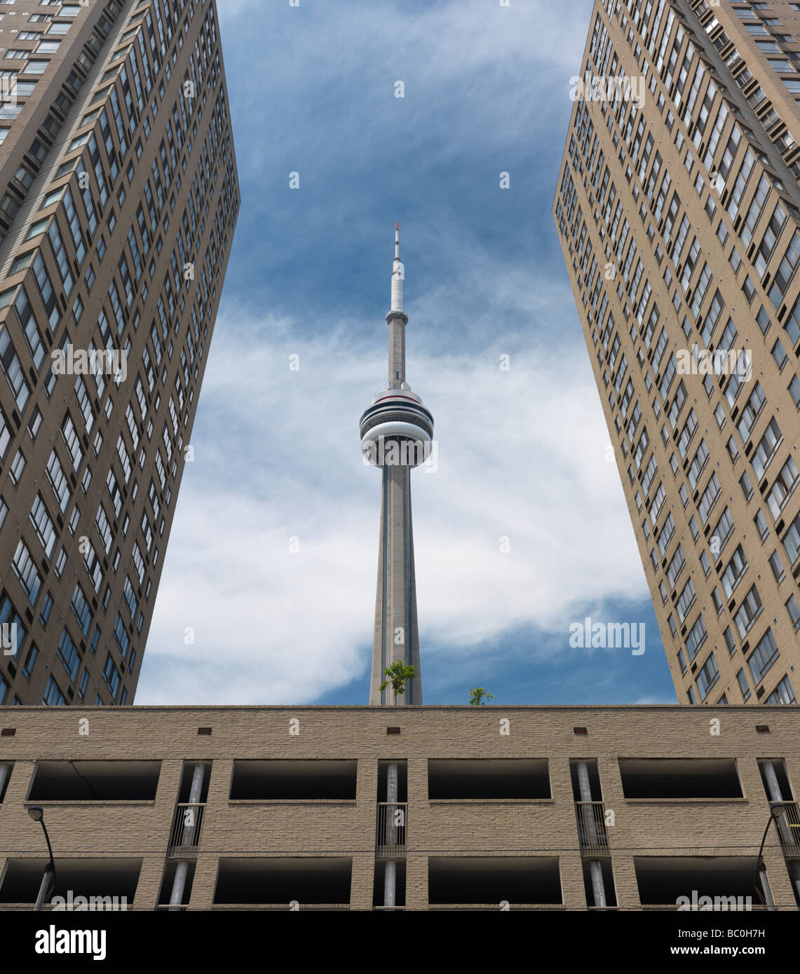 CN tower surrounded with high rise buildings Stock Photo