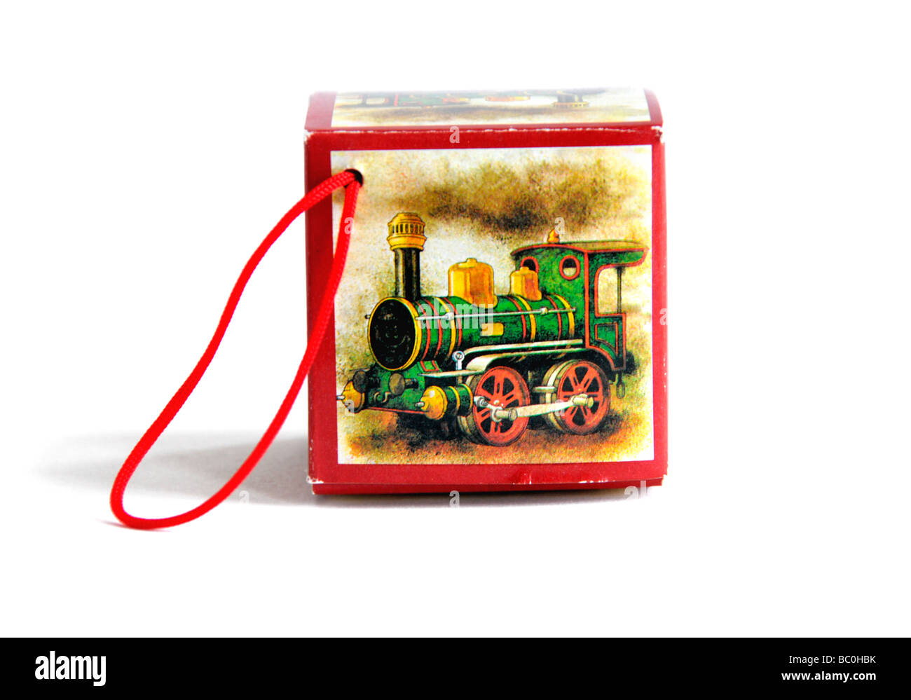 A cutout of  an old fashioned christmas tree decoration depicting a steam engine. Stock Photo