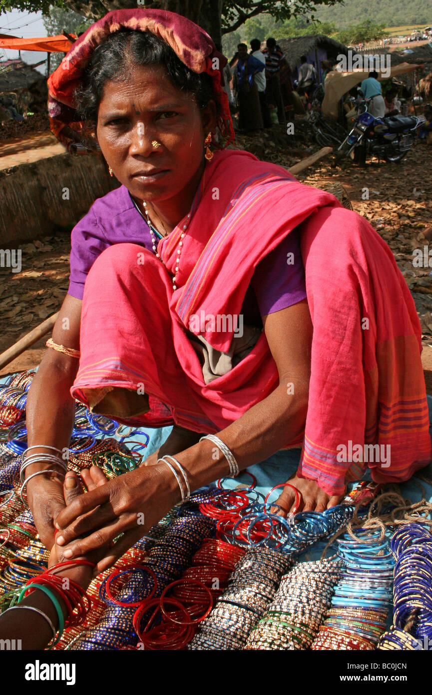 Indian Woman Selling Bangles In A Rural Market At Kunduli, Orissa Stock Photo
