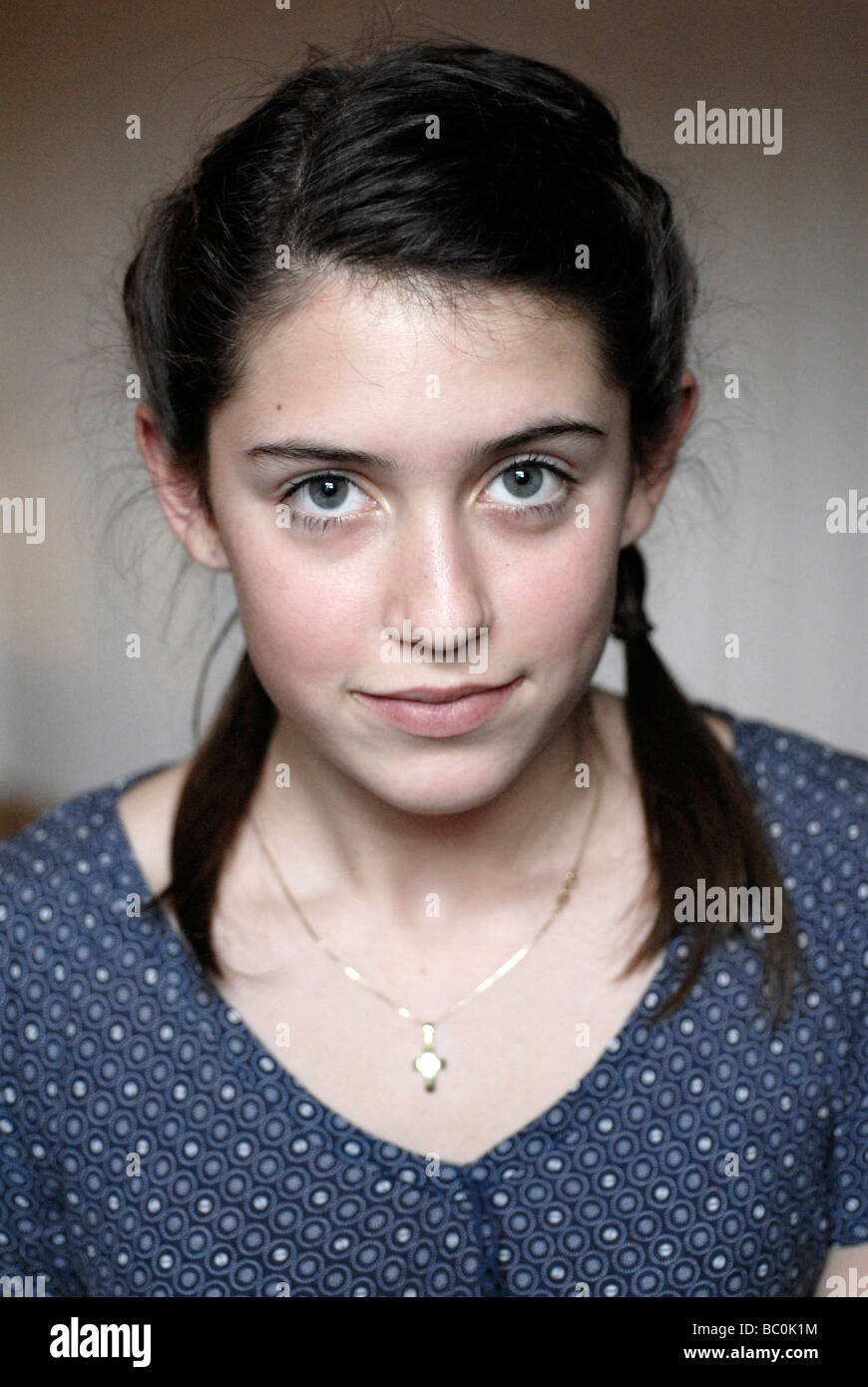 Portrait Of A 13 Year Old Girl With A Old Fashioned Hair Style