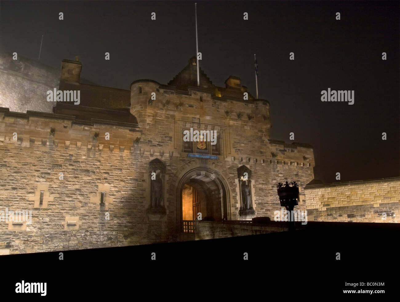 Edinburgh Castle front gate from the Esplanade on a foggy night Stock Photo