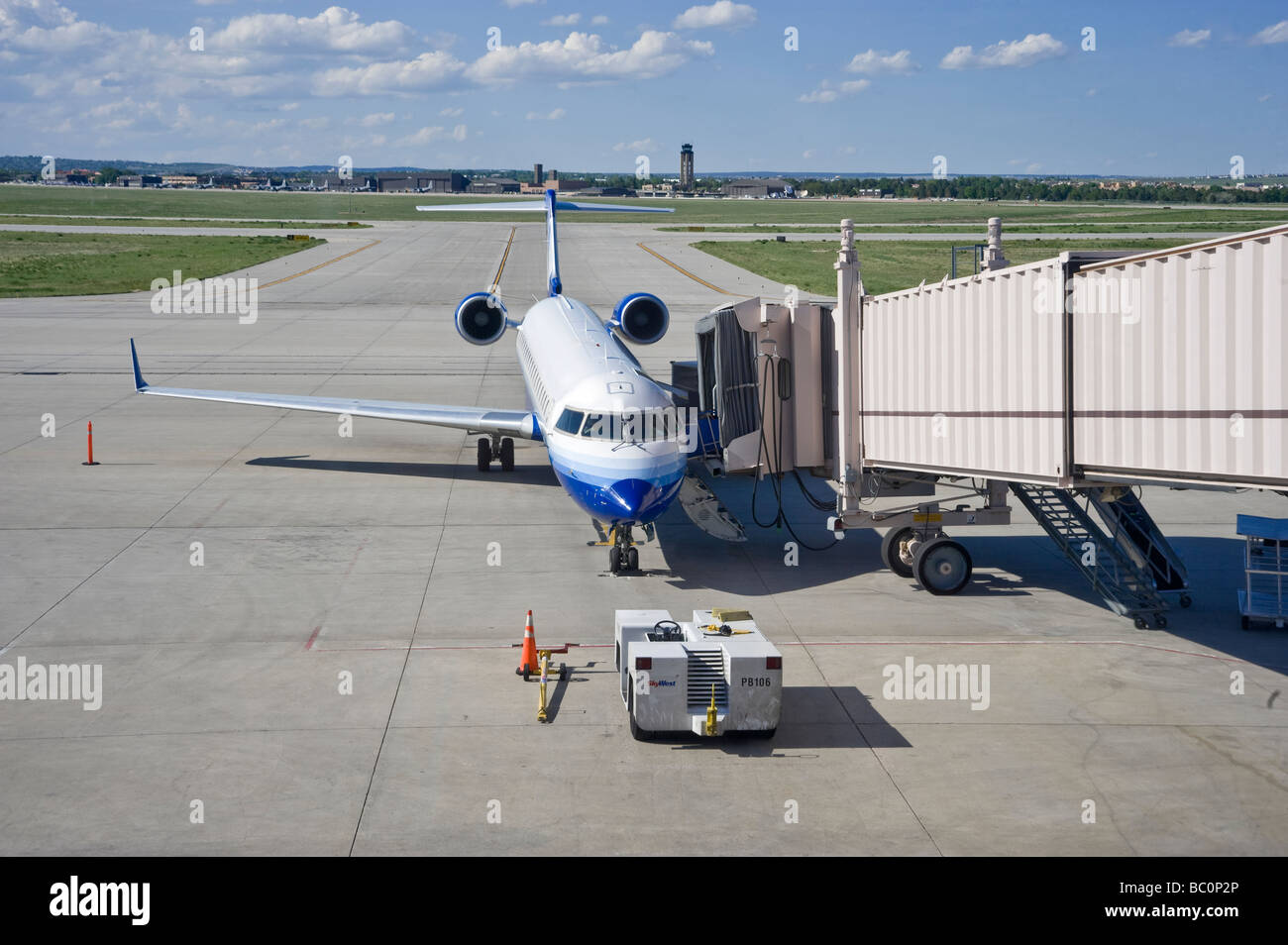 Airplane In Airport With Boarding Ramp Stock Photo Alamy