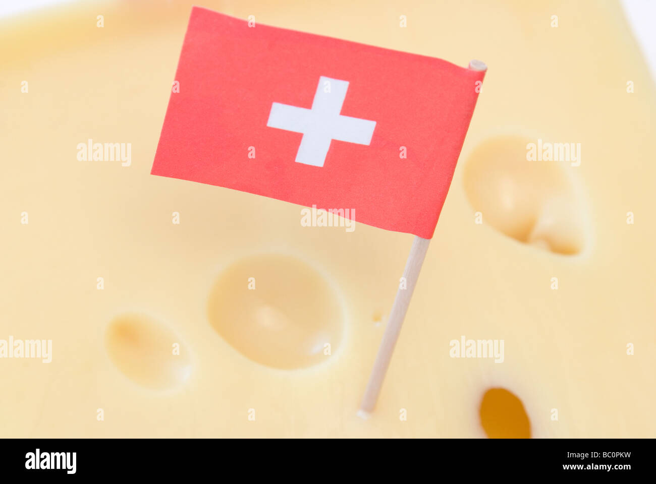 Swiss flag on Emmental cheese Stock Photo