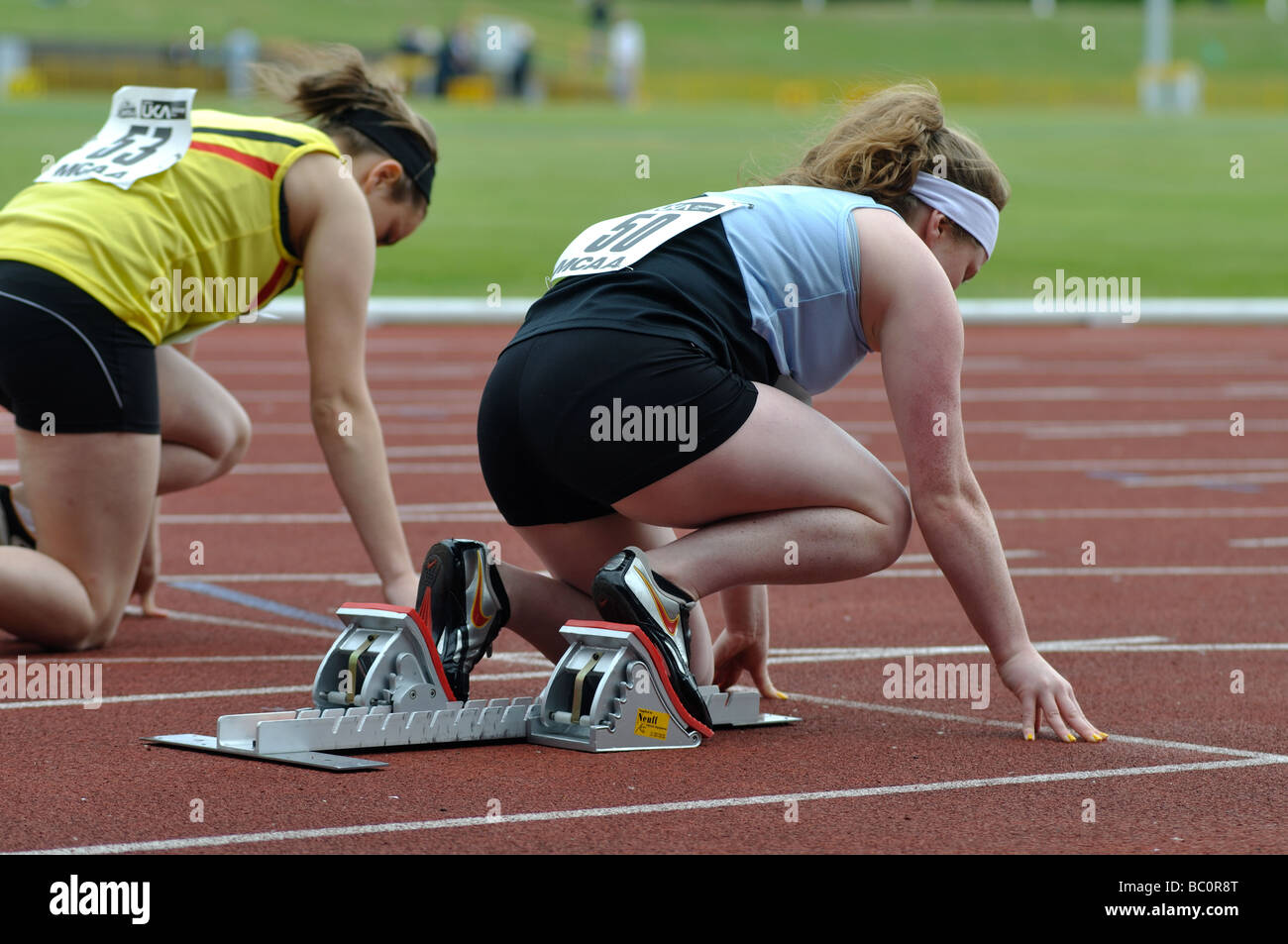 Runner in shop starting blocks