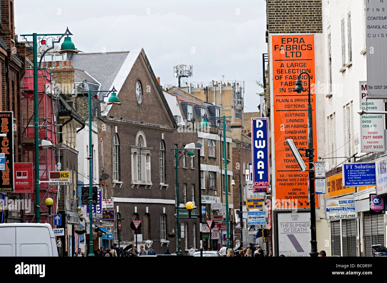 famous curry restaurant signs down brick lane in the east end of london