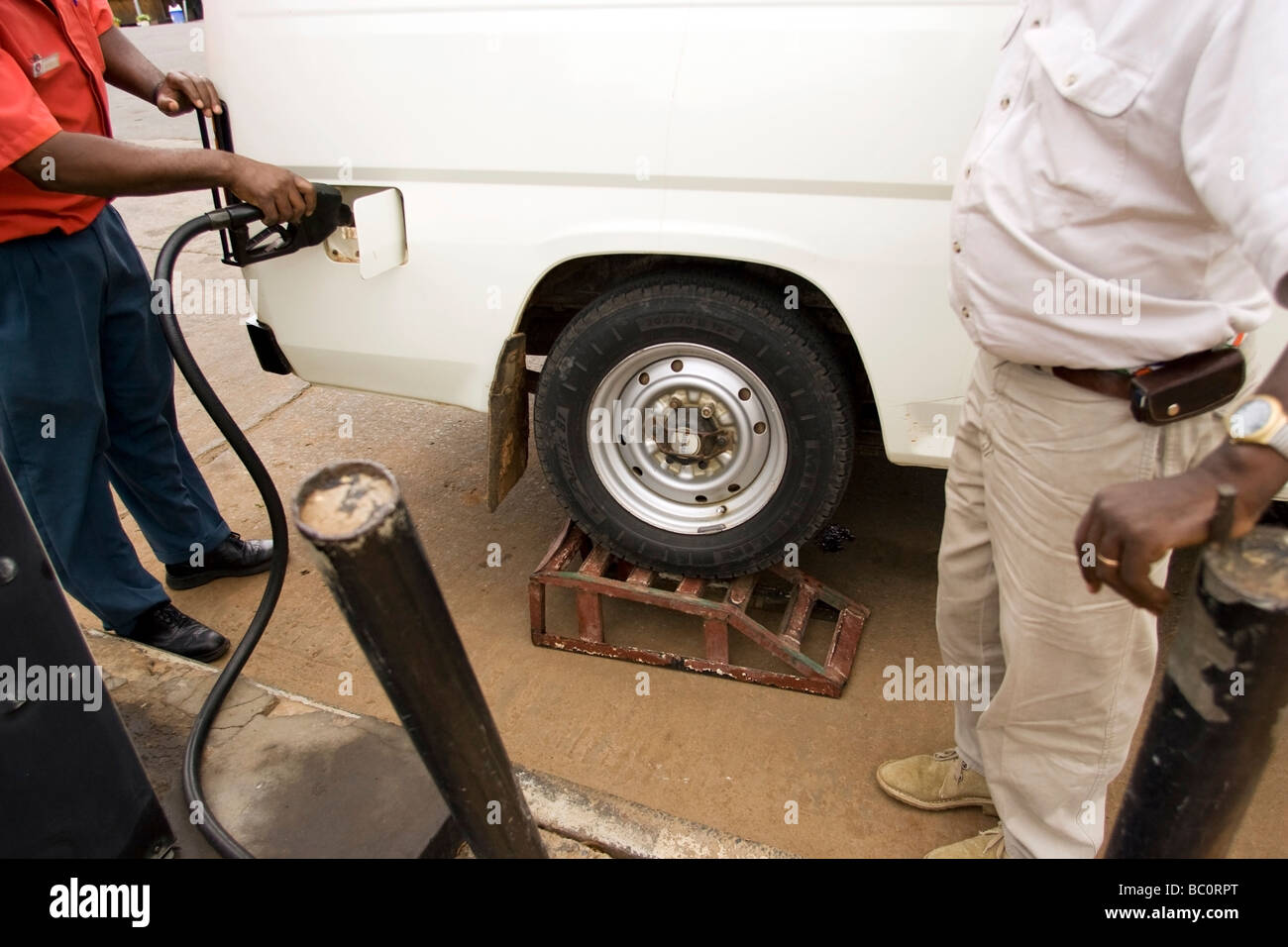 Filling up vehicle at gas station - near Mombasa, Kenya Stock Photo