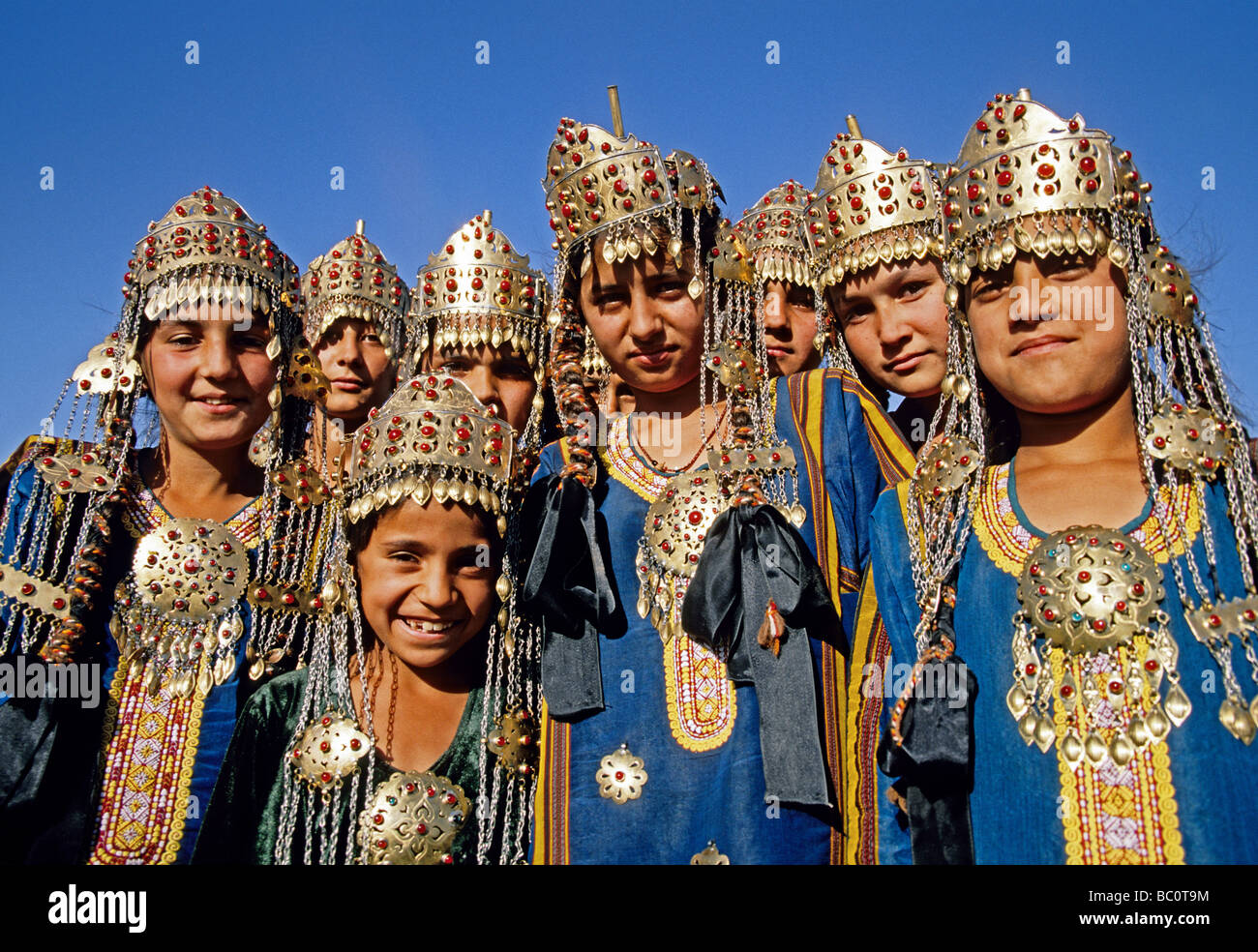 Turkmen school girls in traditional costume for public performance Stock Photo