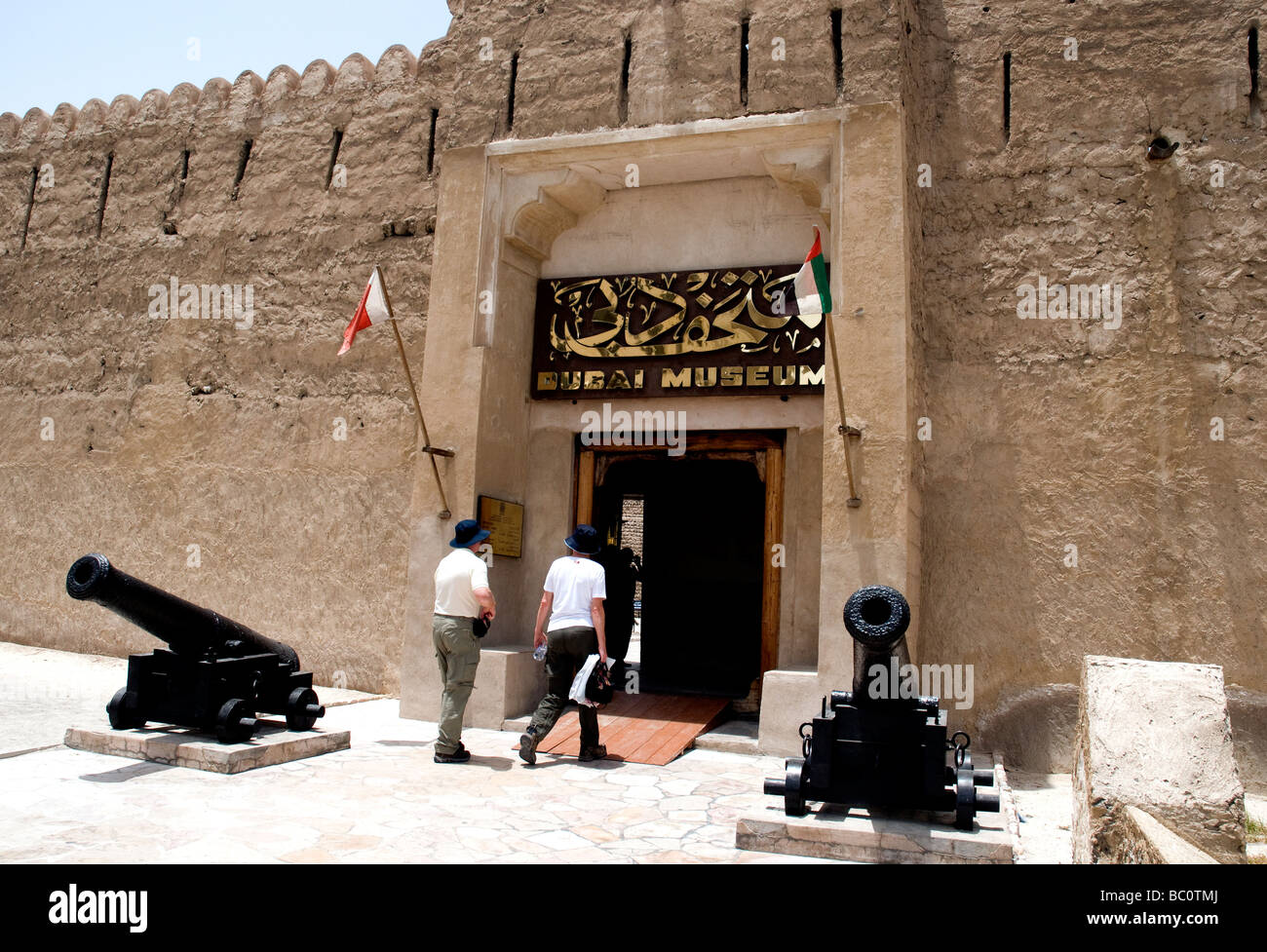 Cannons adorn the entry to the Dubai Museum, fomerly Al-Fahidi fort, in Bur Dubai, the city's Left Bank neighborhood Stock Photo