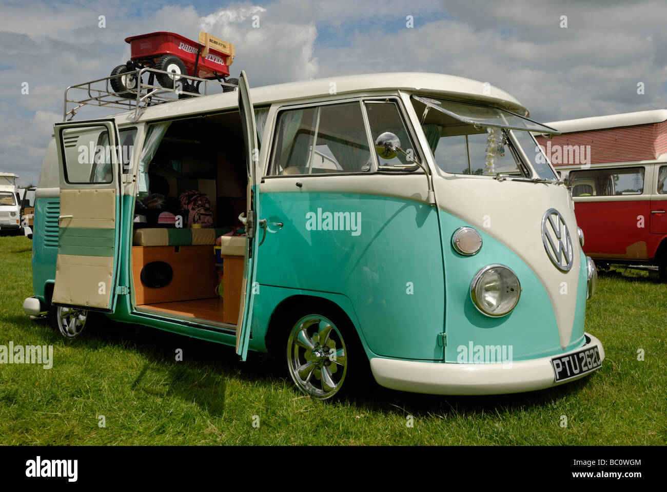 A split screen VW camper van with open 'barn doors'. Wymeswold, Leicestershire, England. Stock Photo