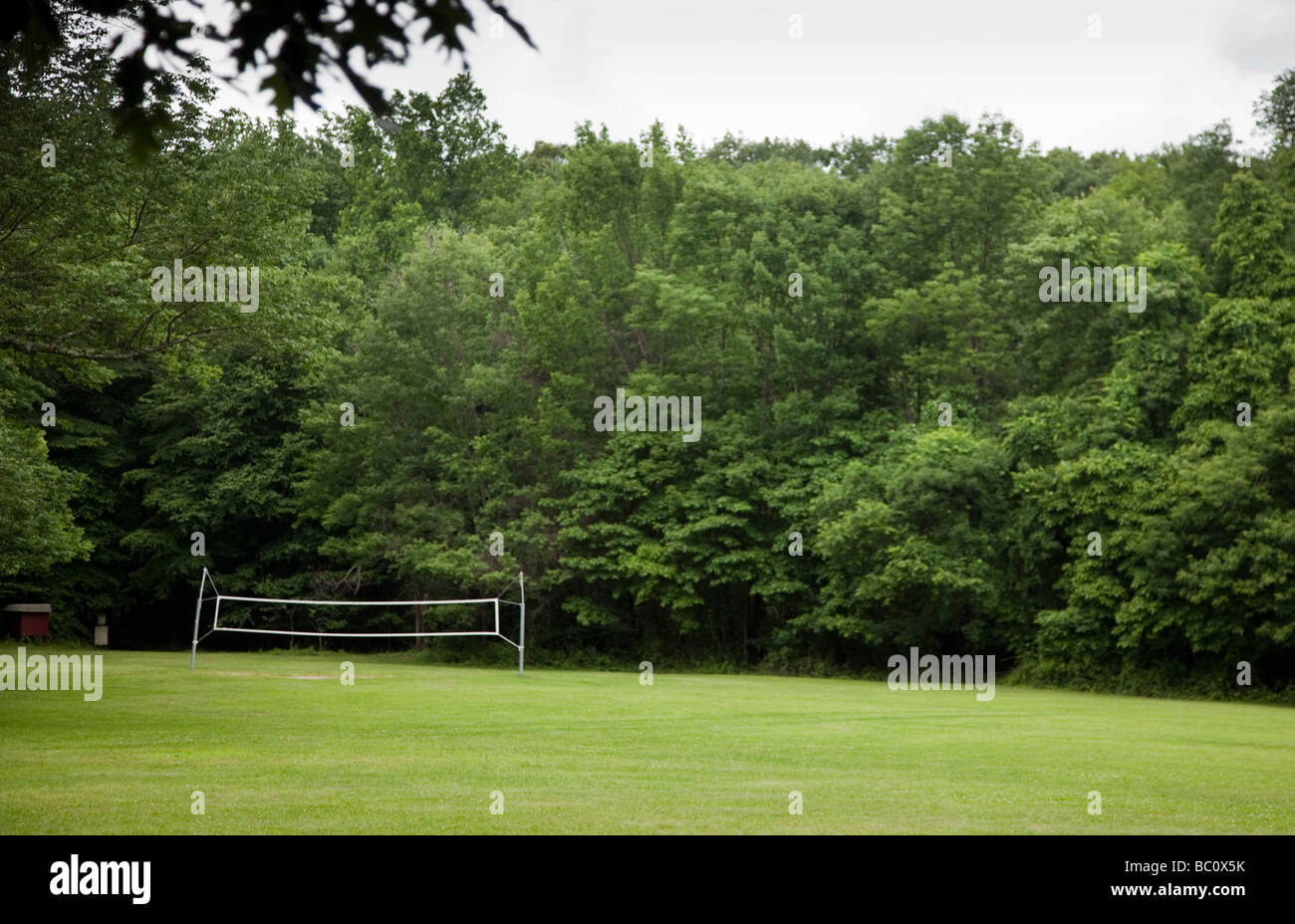 A volleyball net in a field Stock Photo