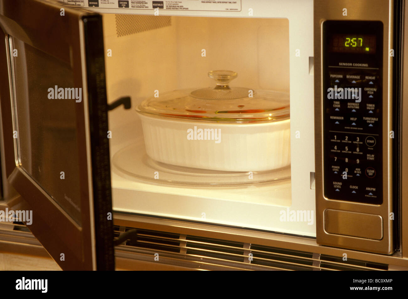 microwave appliance with casserole Stock Photo Alamy