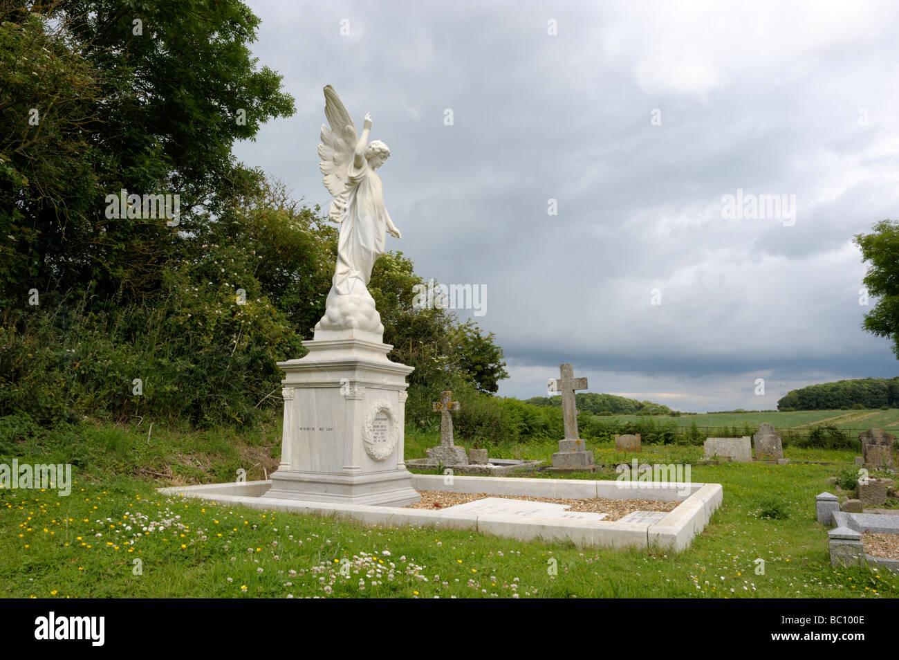 Angelic stone memorial Stock Photo