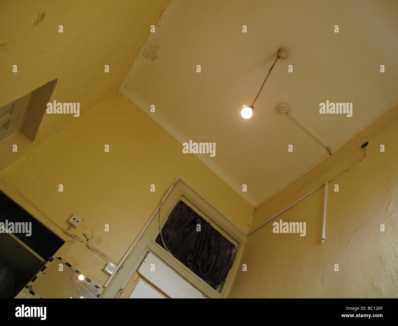 Shabby hotel room Stock Photo