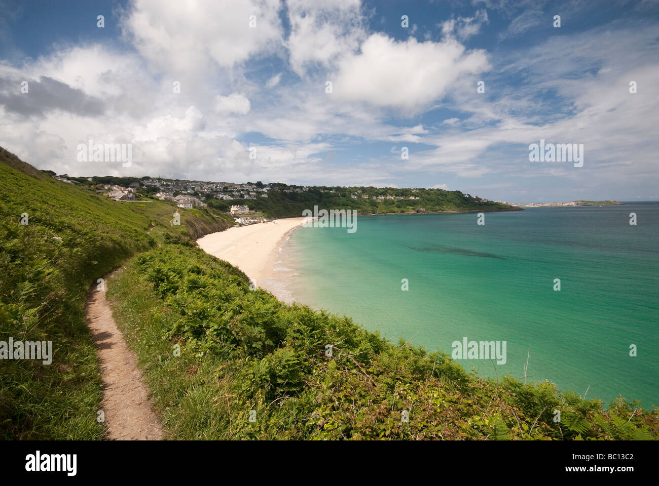 Beautiful Beaches like Carbis Bay in Cornwall are visible from the Coastal Path Stock Photo