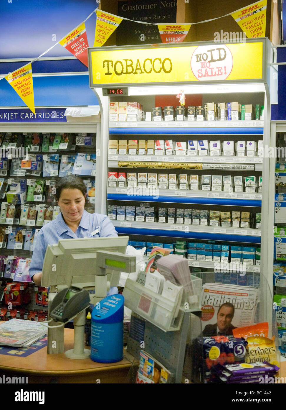 Tobacco for sale at the checkout, WH Smith store, UK Stock Photo