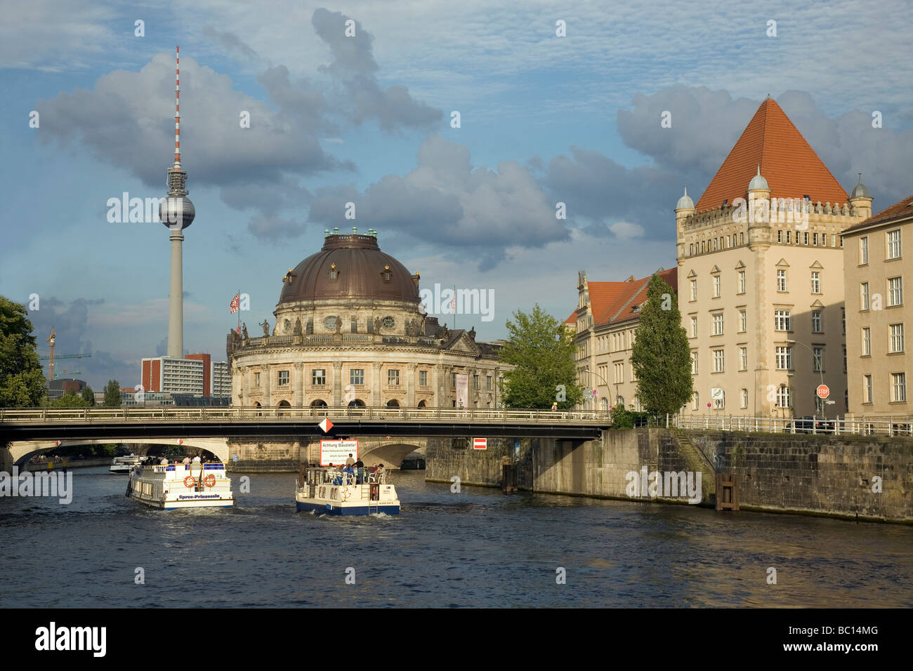 River Spree with Bode Museum, Fernsehturm and tourist boats, Berlin, Germany Stock Photo