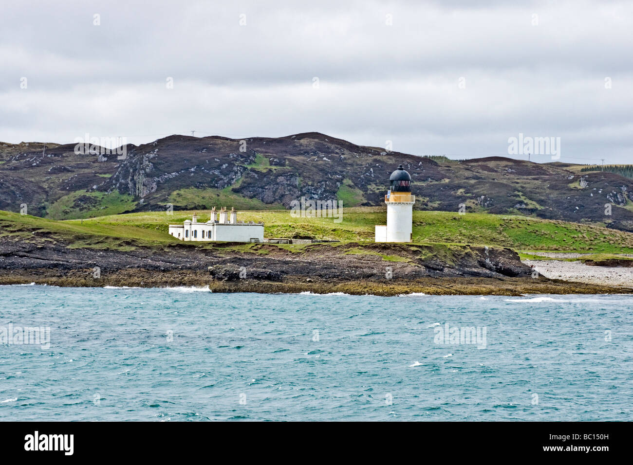 Lighthouse at the entrance to Stornoway on the Isle of Lewis Outer Hebrides Scotland Stock Photo