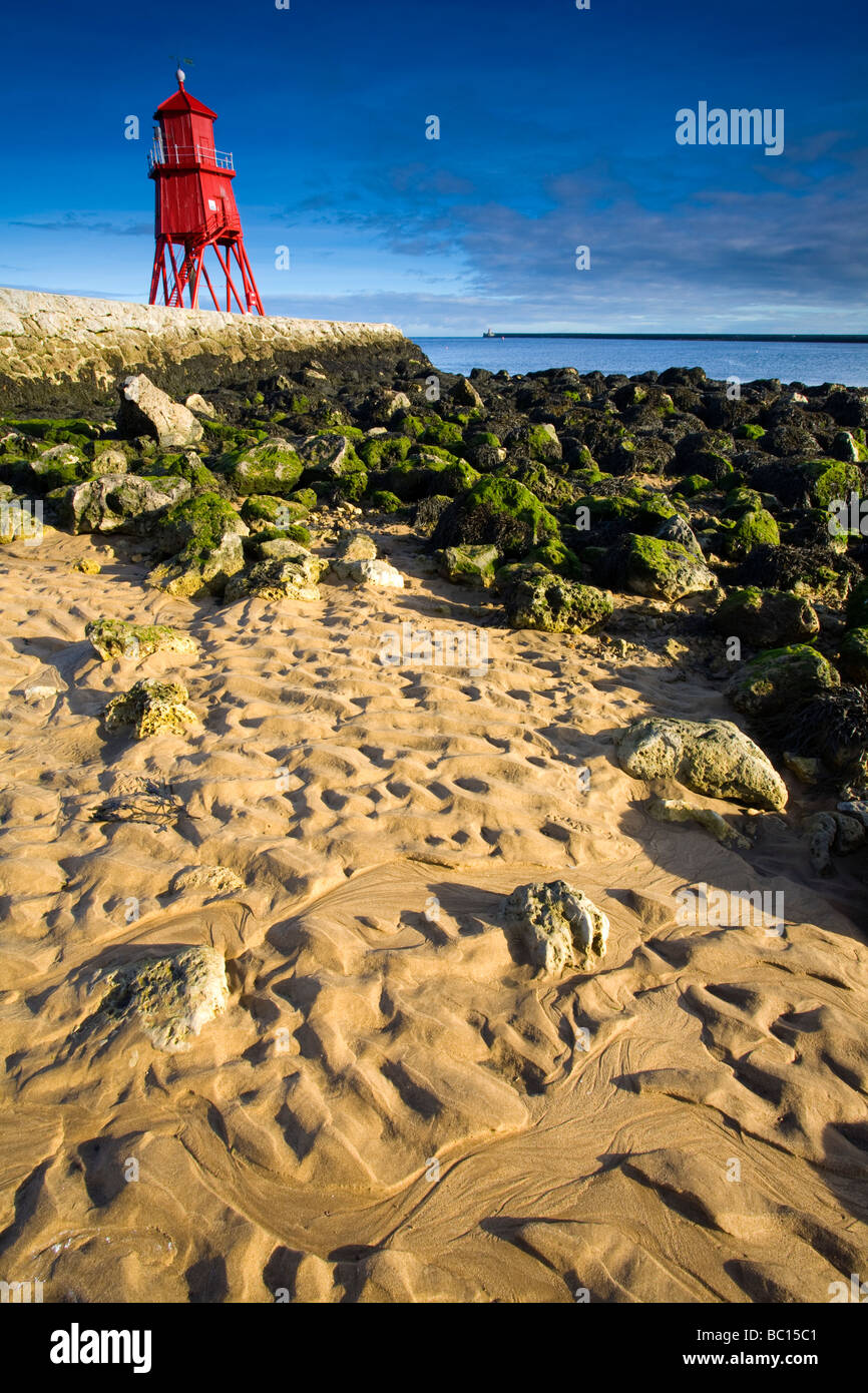 England Tyne Wear South Shields Little Haven Beach looking towards the South Groyne Lighthouse Stock Photo