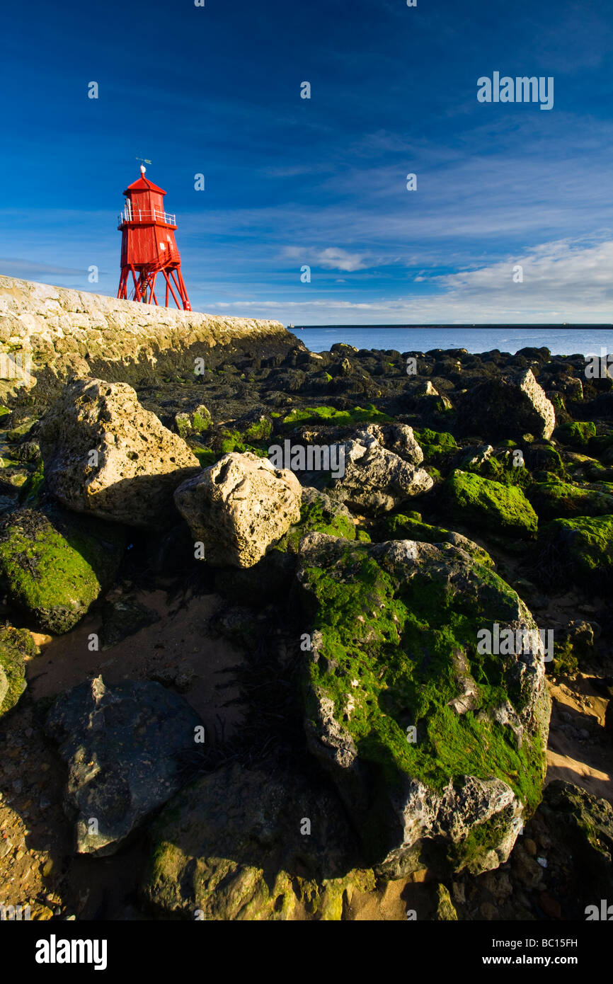 England Tyne Wear South Shields Little Haven Beach looking towards the South Groyne Lighthouse Stock Photo