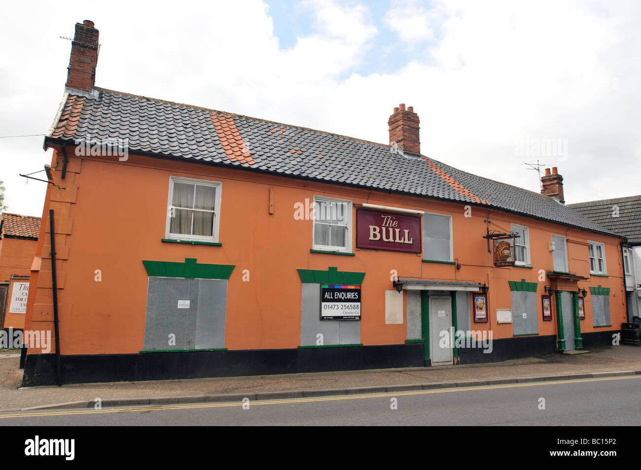 The Bull pub closed and boarded up Watton Thetford Norfolk UK . Stock Photo