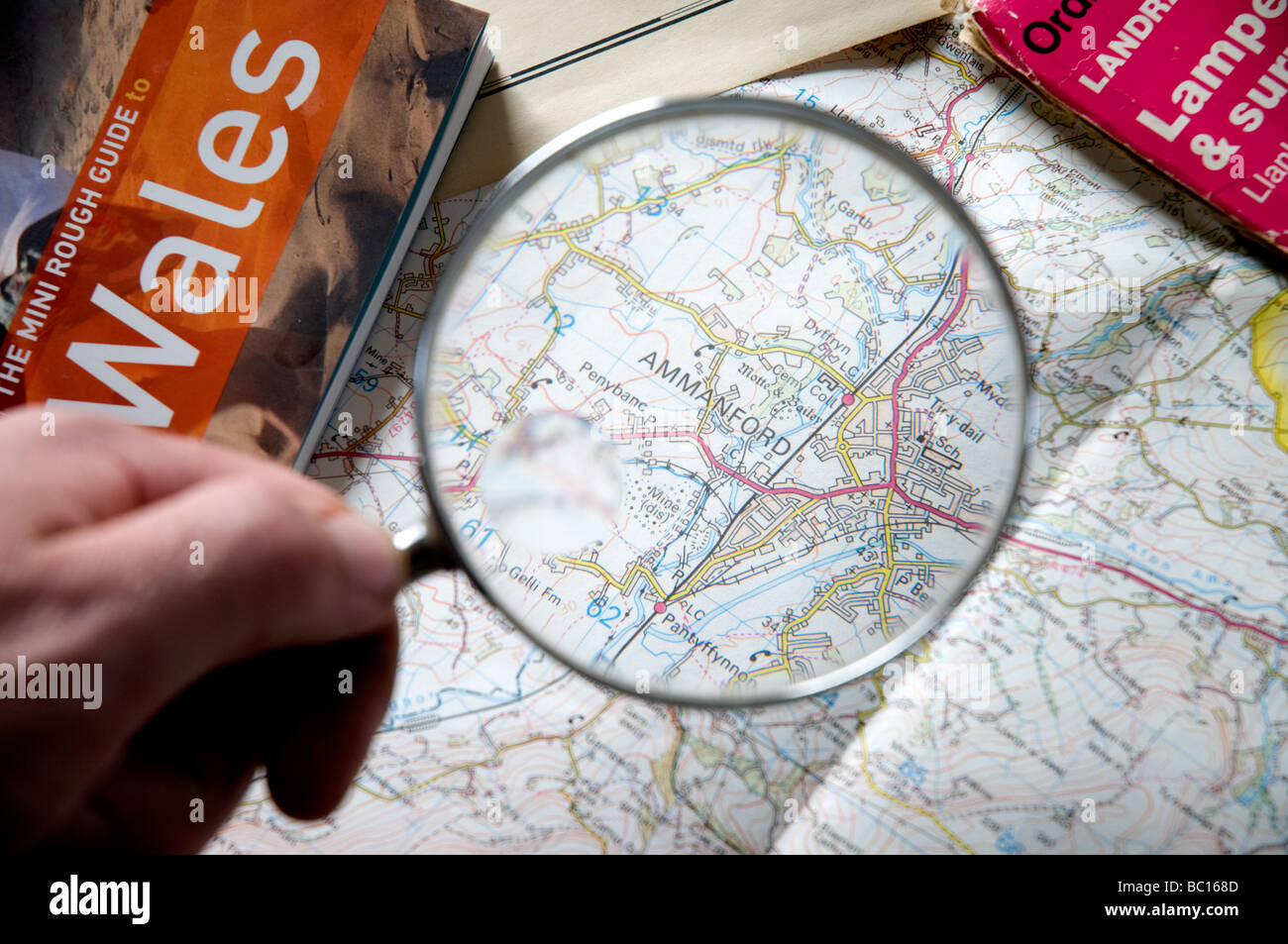 Map of Ammanford in west wales shown through a Magnifying glass Stock