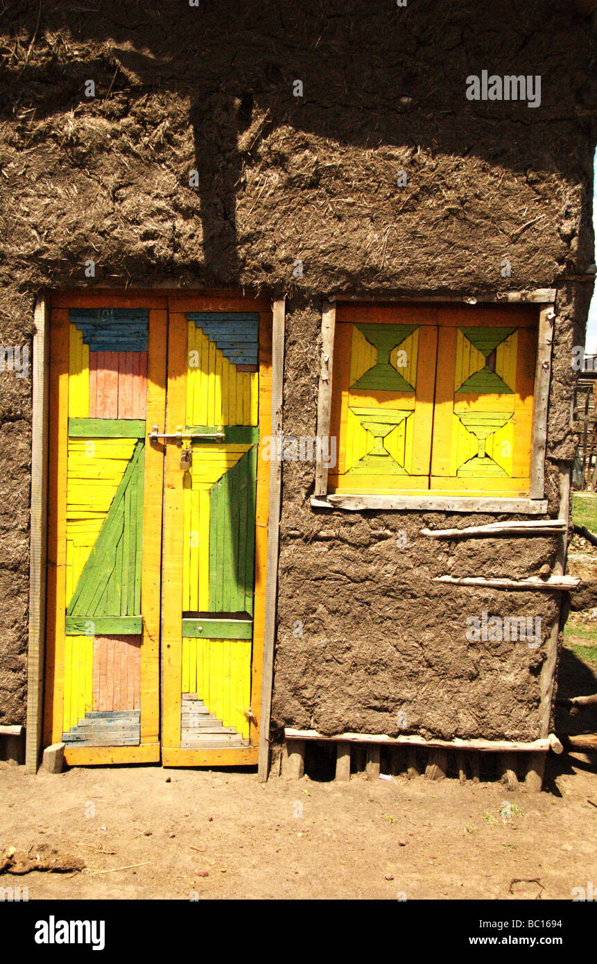 Africa Ethiopia Konso mud hut with vivid door and window Stock Photo