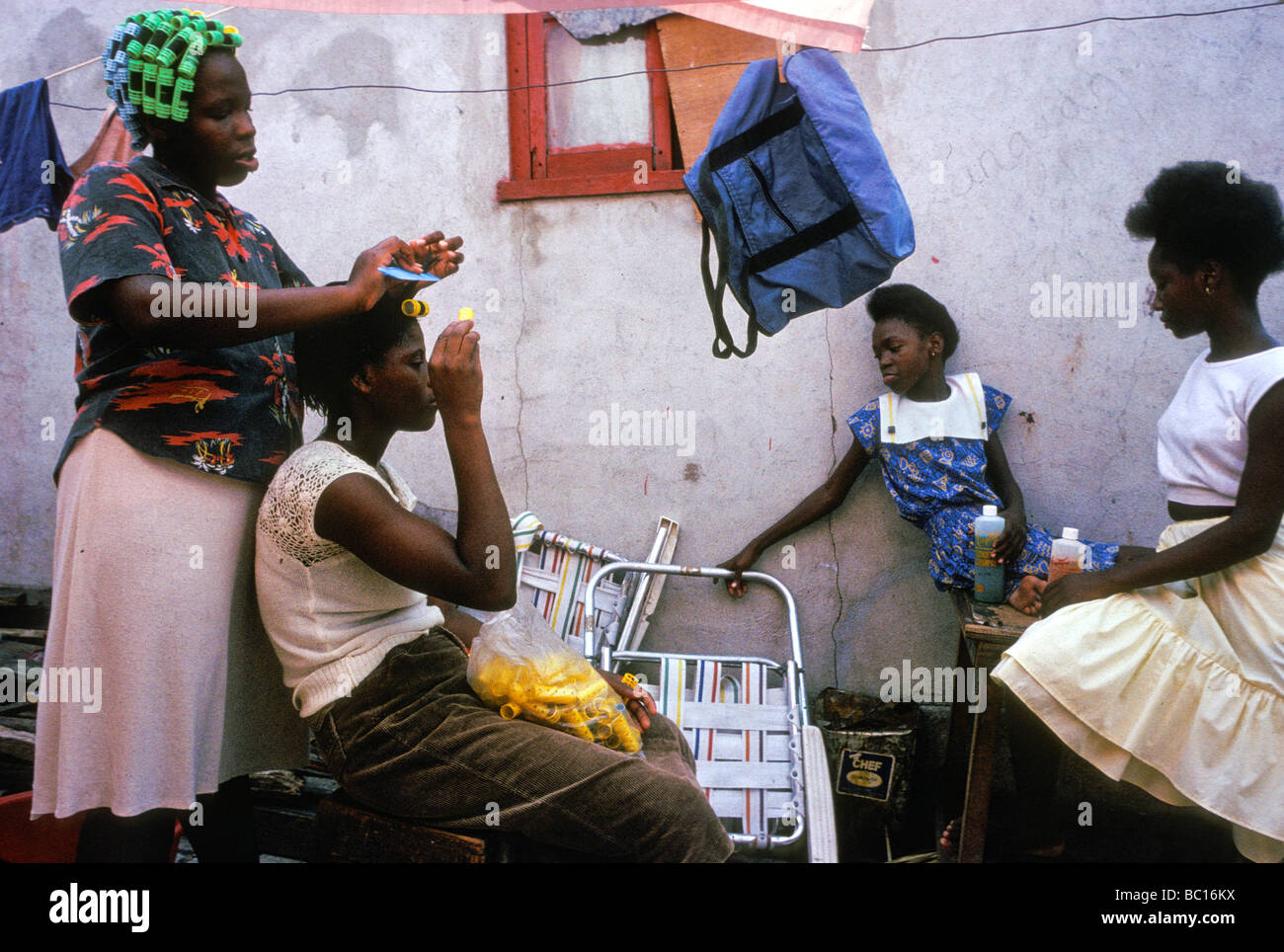 Women braid their hair in Kingston, Jamaica Stock Photo Alamy