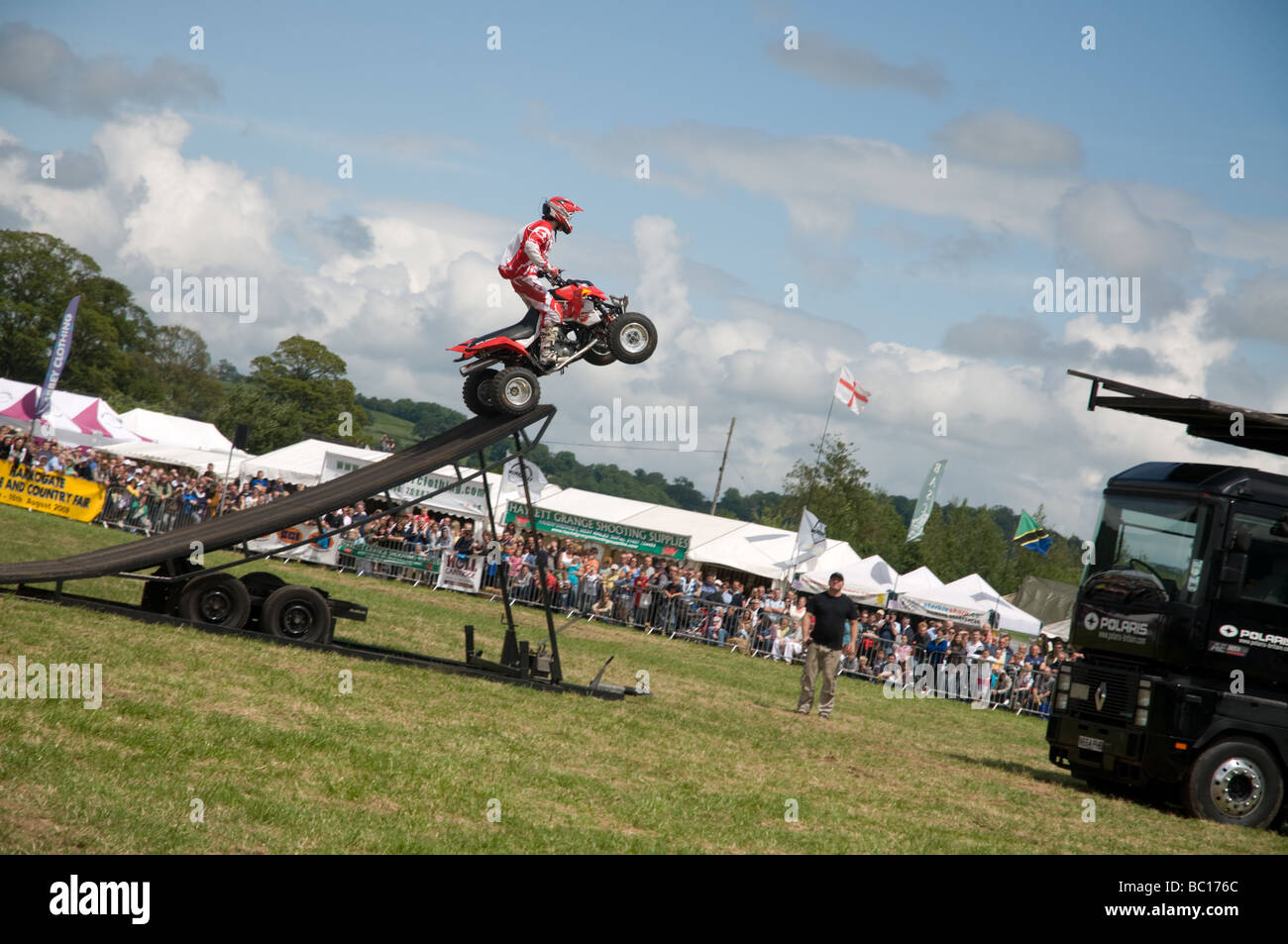 Ex-world championship moto-cross rider Jason Smyth performing motorcycle stunts at the Welsh game fair 2009 Stock Photo