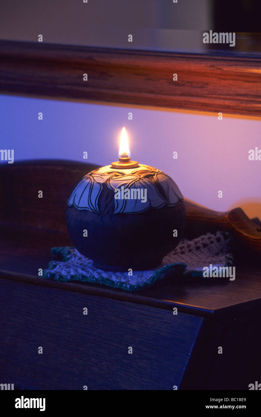 oil lamp lantern light burn flame glow warm ceramic Stock Photo Alamy