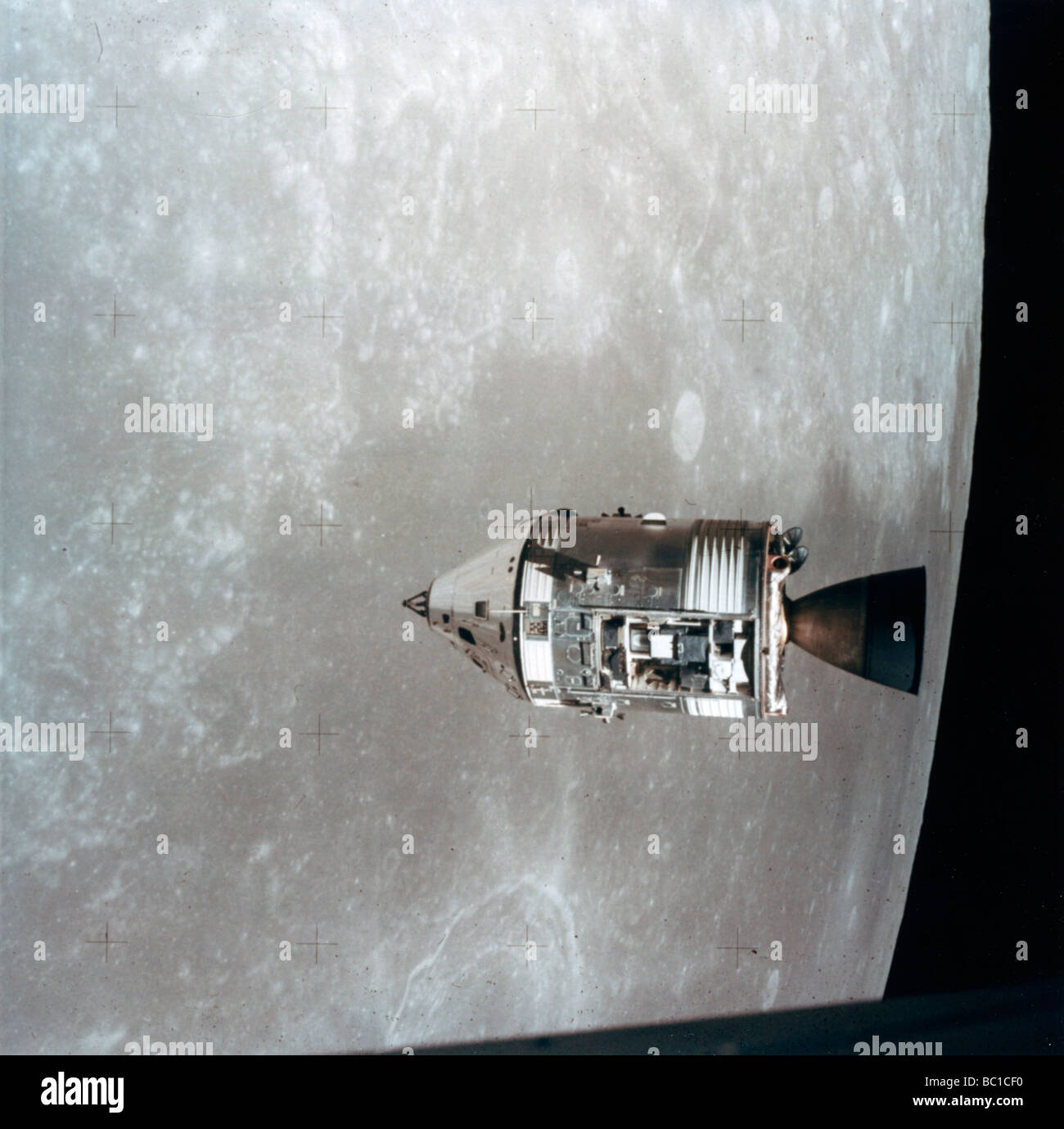 The Apollo 15 Command and Service Modules in lunar orbit, 1971.Artist