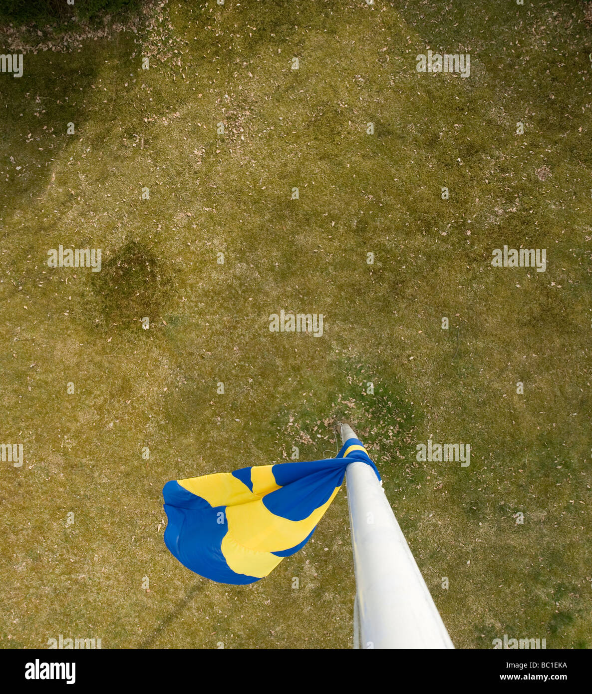Swedish flag at half-staff, as seen from 'above view' Stock Photo